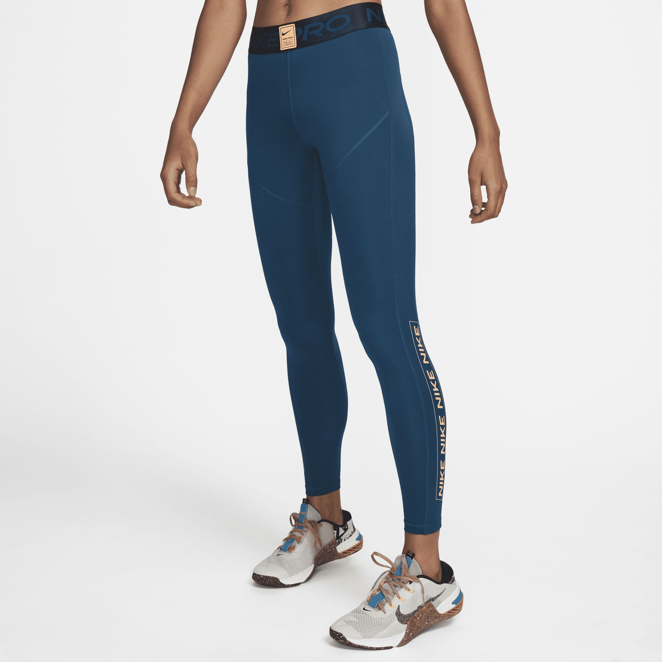 Damskie legginsy ze średnim stanem i grafiką Nike Pro - Niebieski