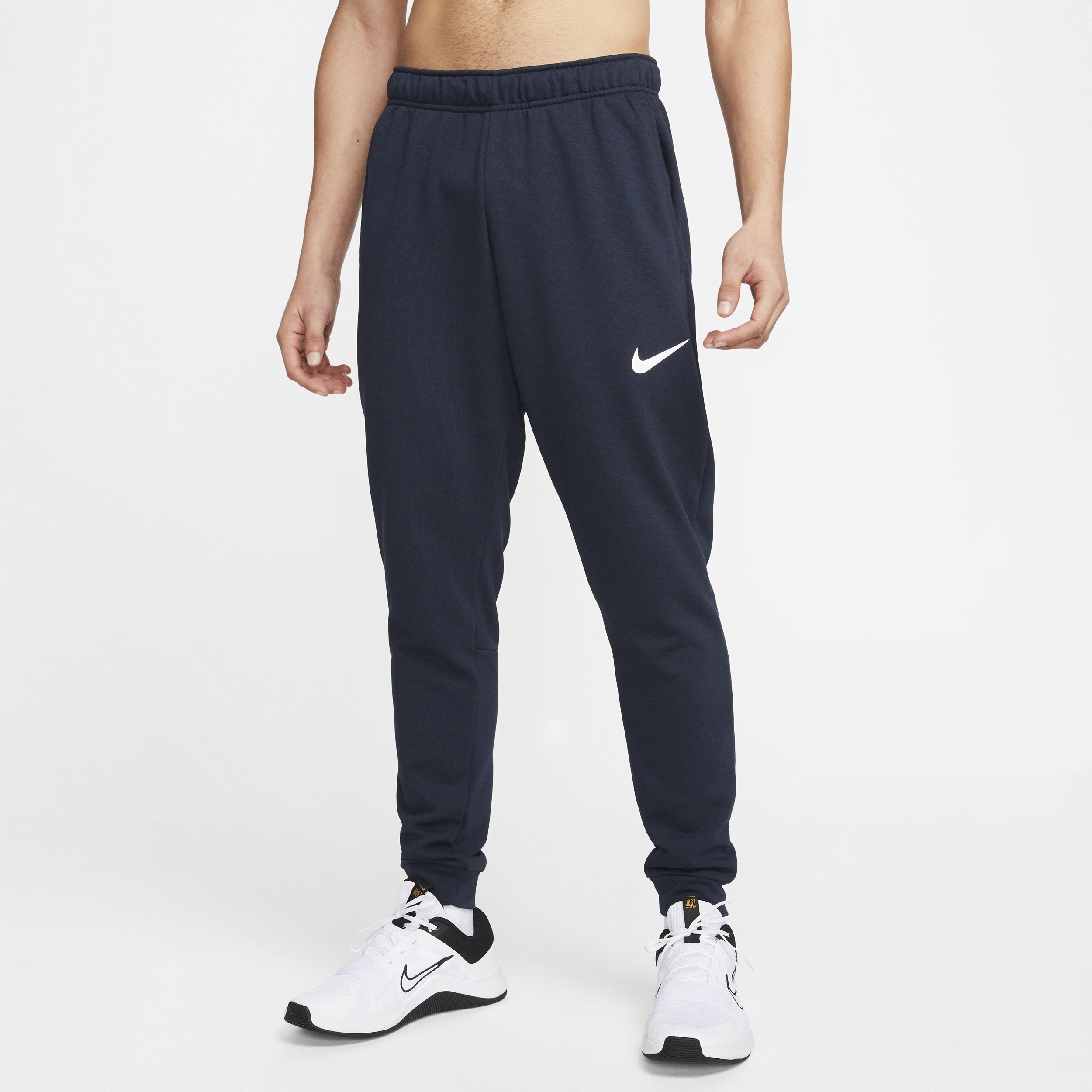 Image of Nike Dry Dri-FIT toelopende fitnessbroek van fleece voor heren - Blauw