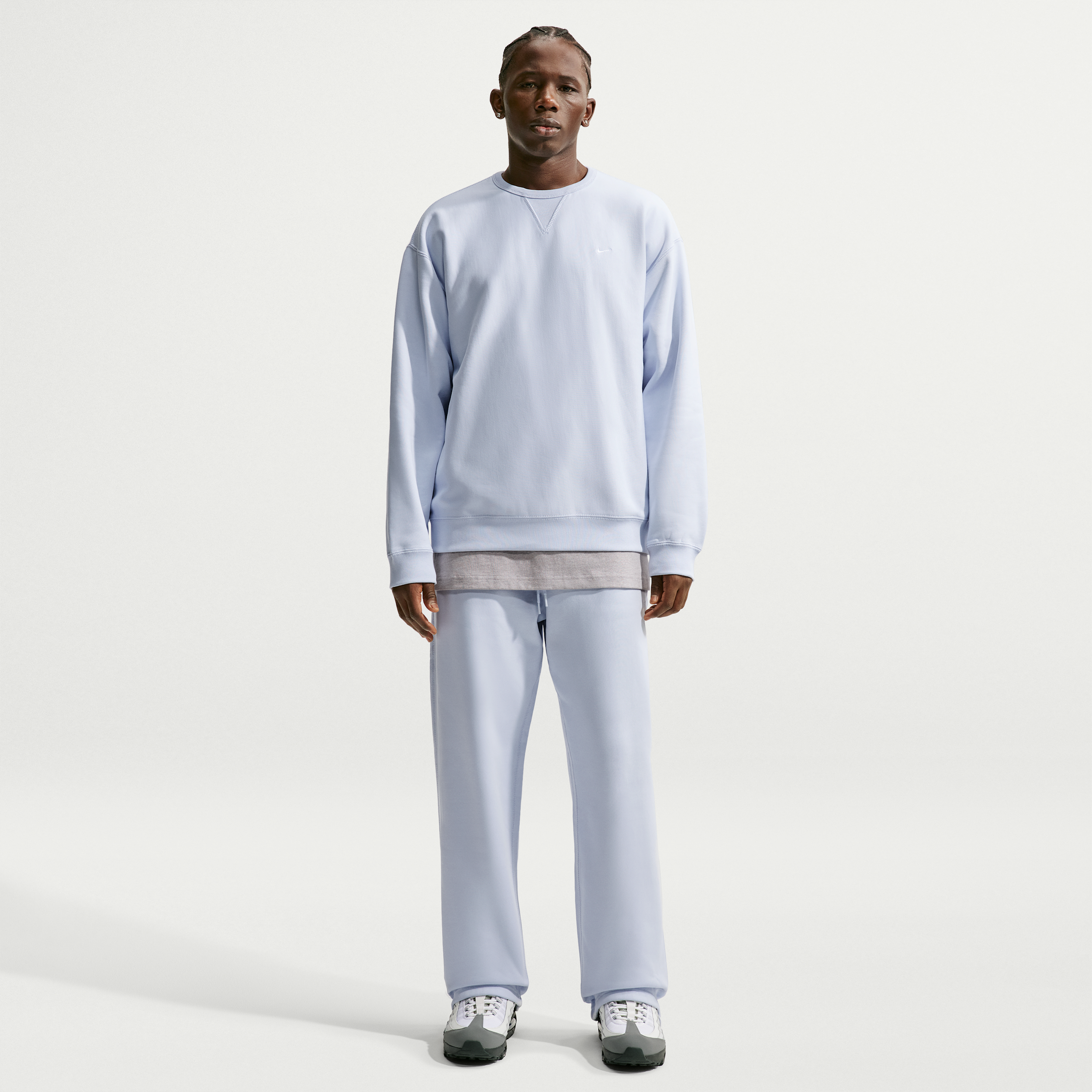 Nike Solo Swoosh-fleecebukser med åben kant til mænd - grå