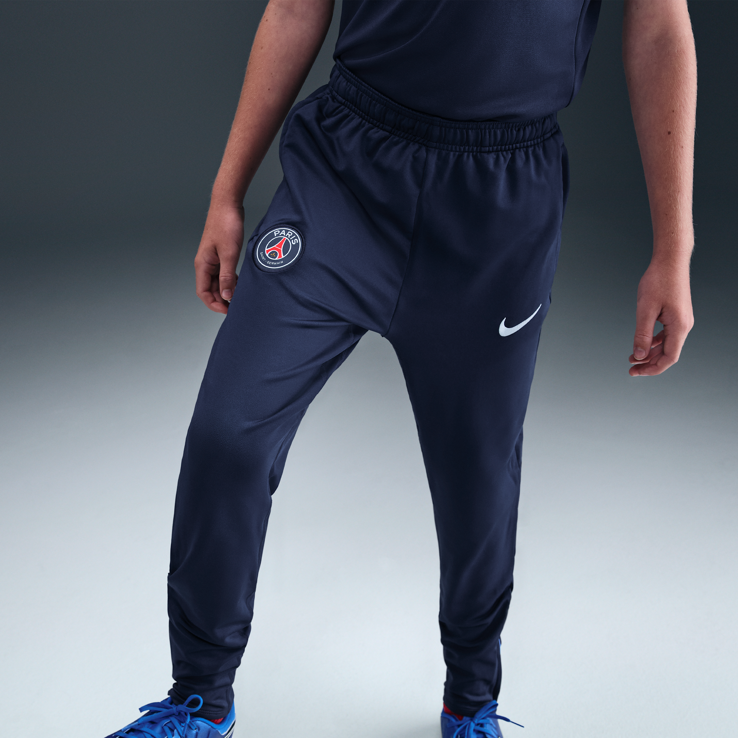 Nike Paris Saint-Germain Strike Dri-FIT knit voetbalbroek voor kids Blauw