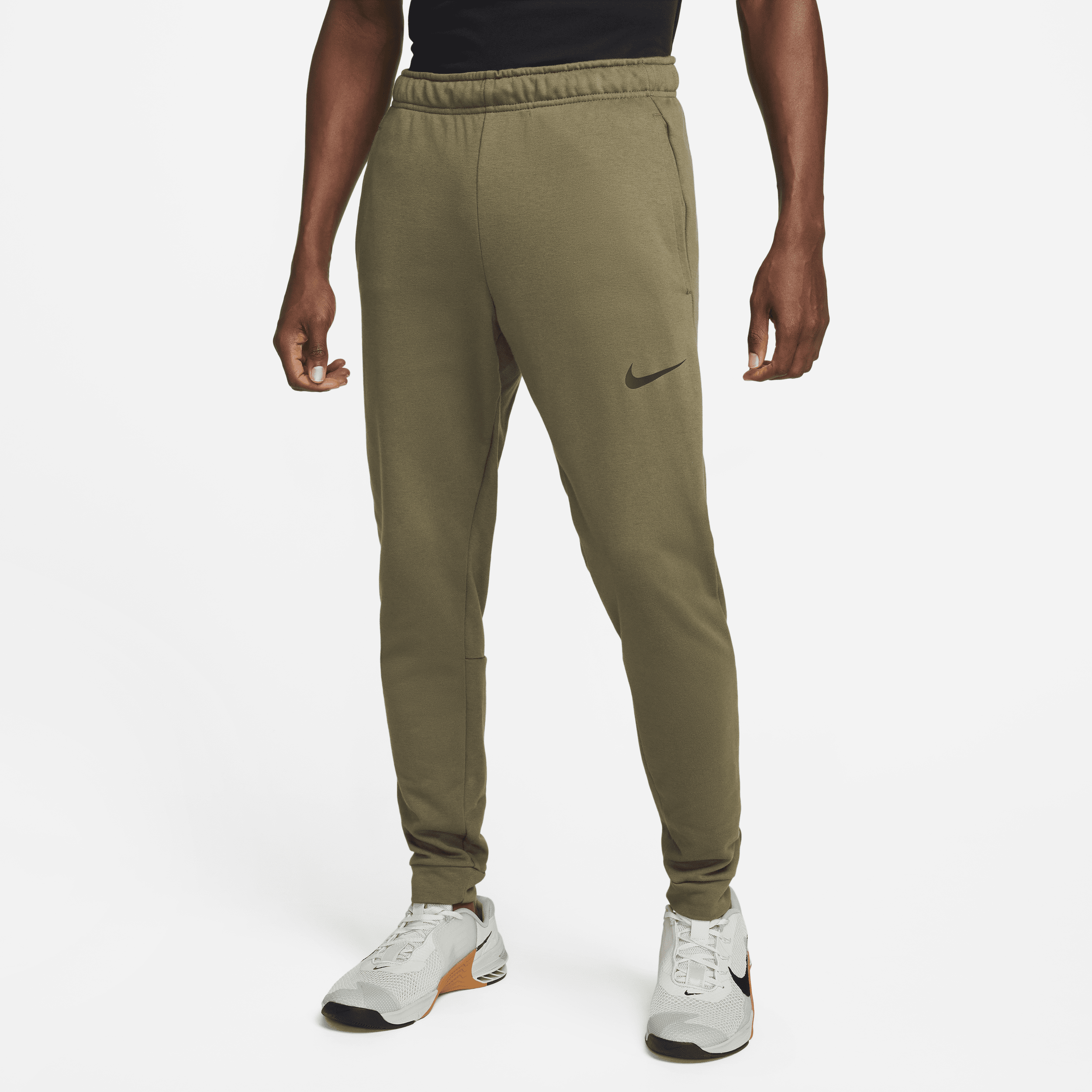 Image of Nike Dry Dri-FIT toelopende fitnessbroek van fleece voor heren - Groen