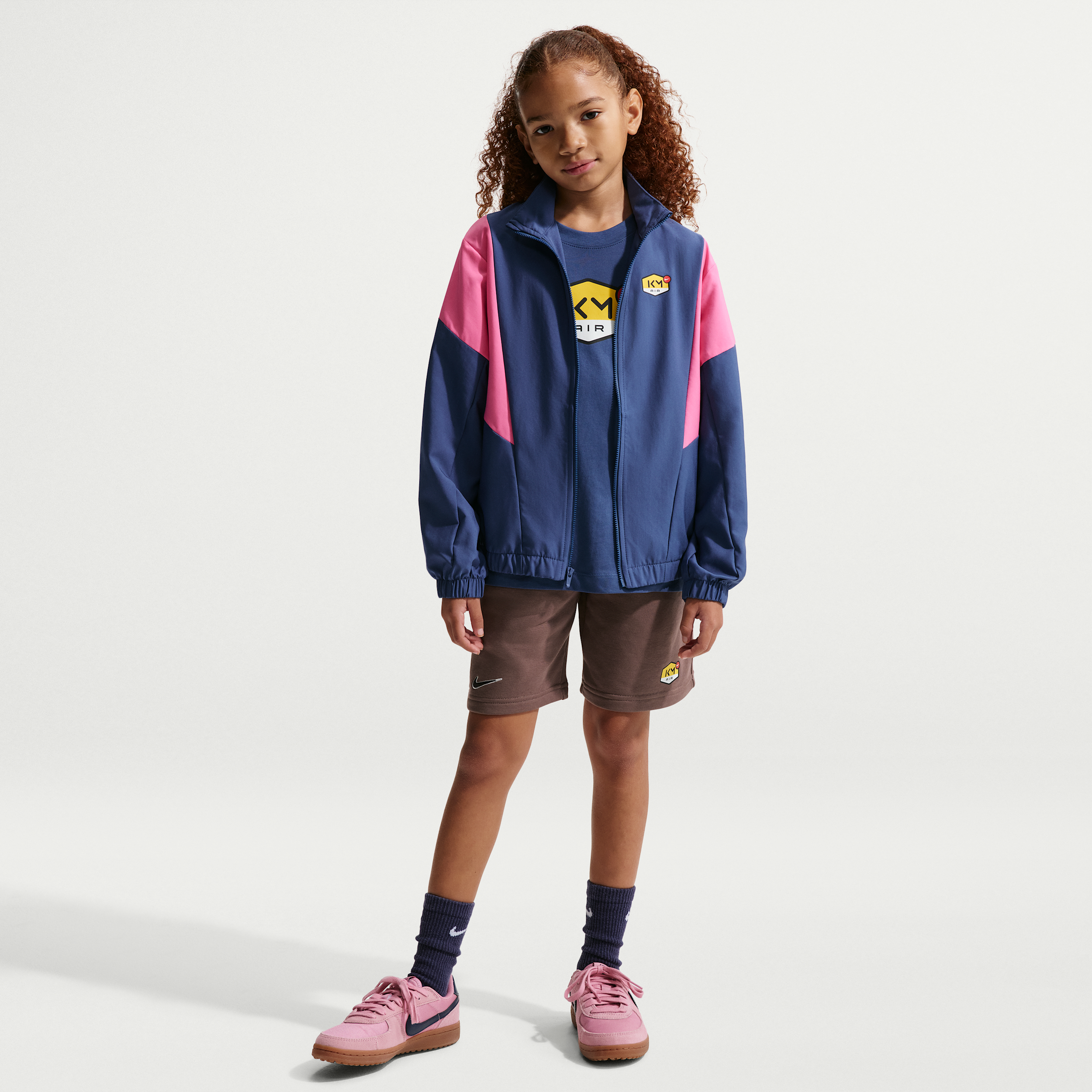 Shorts da calcio Kylian Mbappé in Club Fleece – Ragazzo/a - Marrone