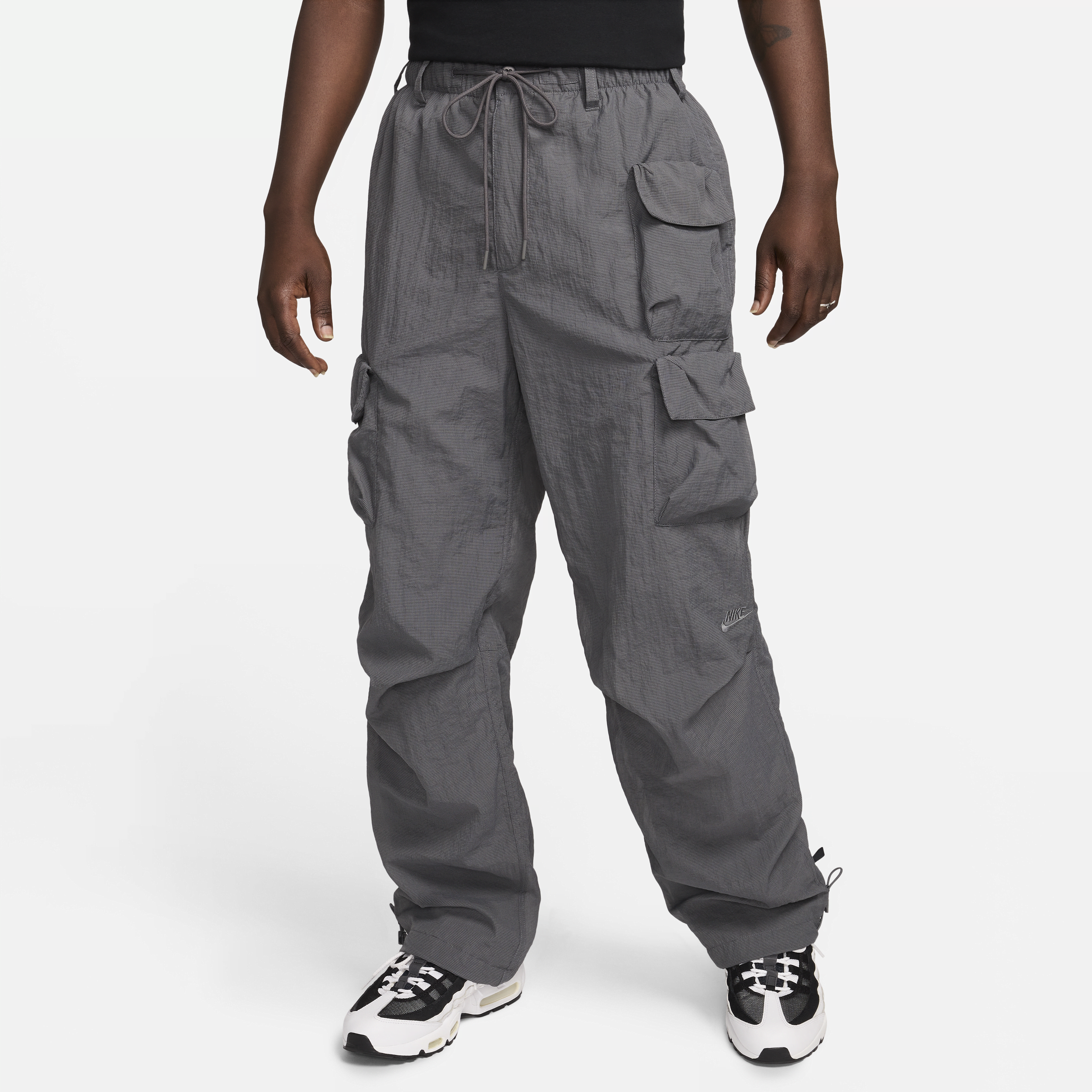Vævede Nike Sportswear Tech Pack-bukser med indershorts til mænd - grå