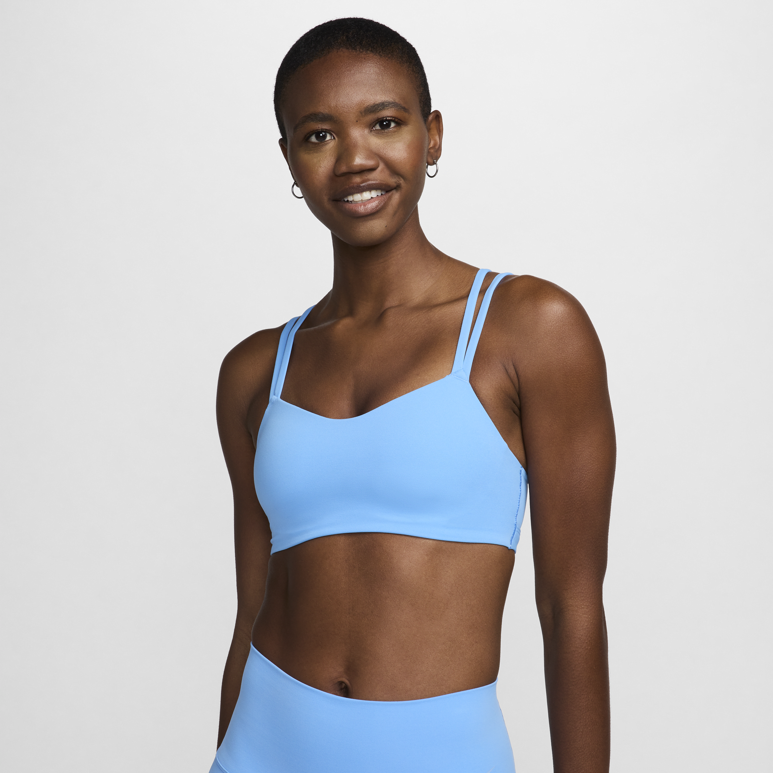 Nike Zenvy Strappy-sports-bh med let støtte og indlæg til kvinder - blå