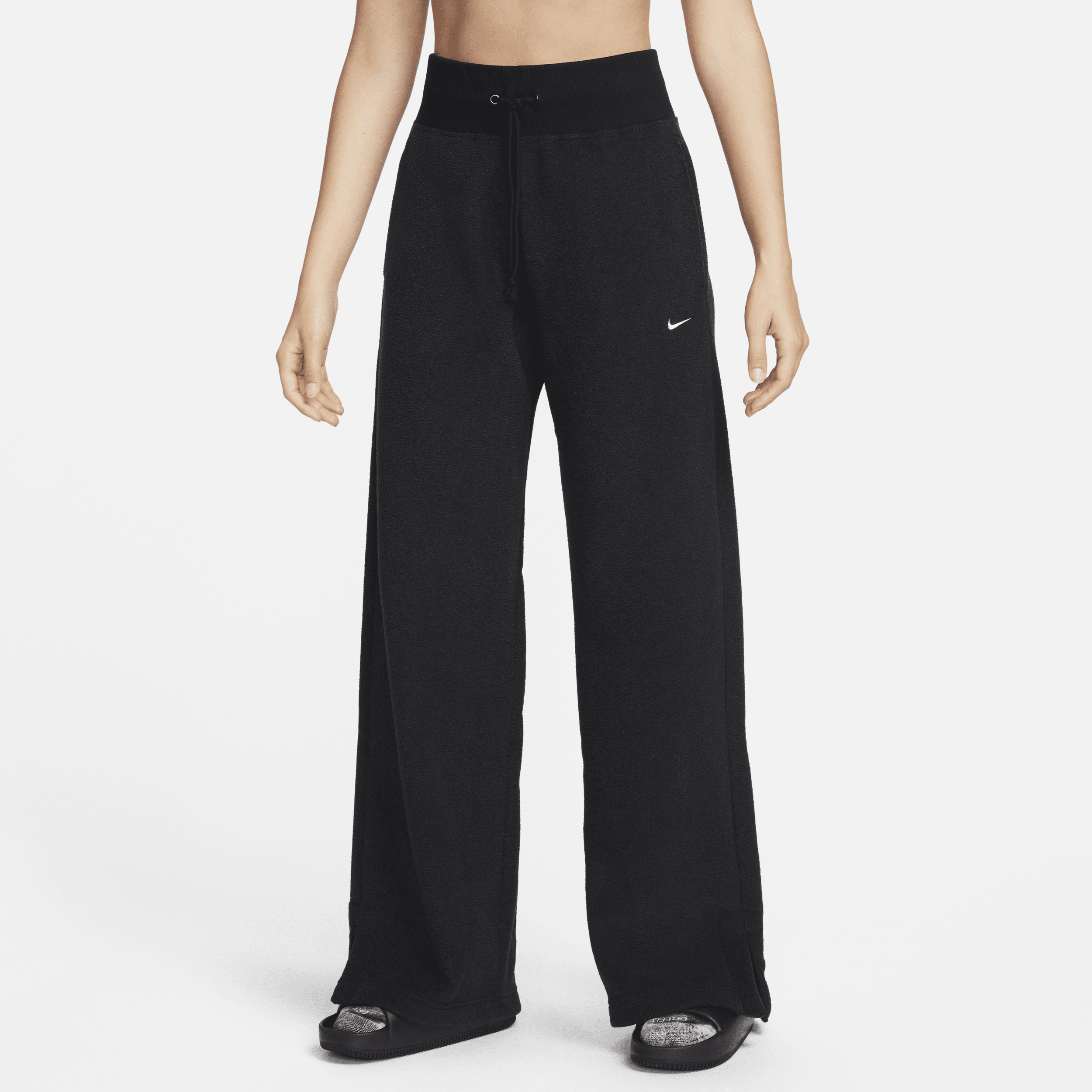Pantaloni confortevoli in fleece a gamba larga e vita alta Nike Sportswear Phoenix Plush – Donna - Nero