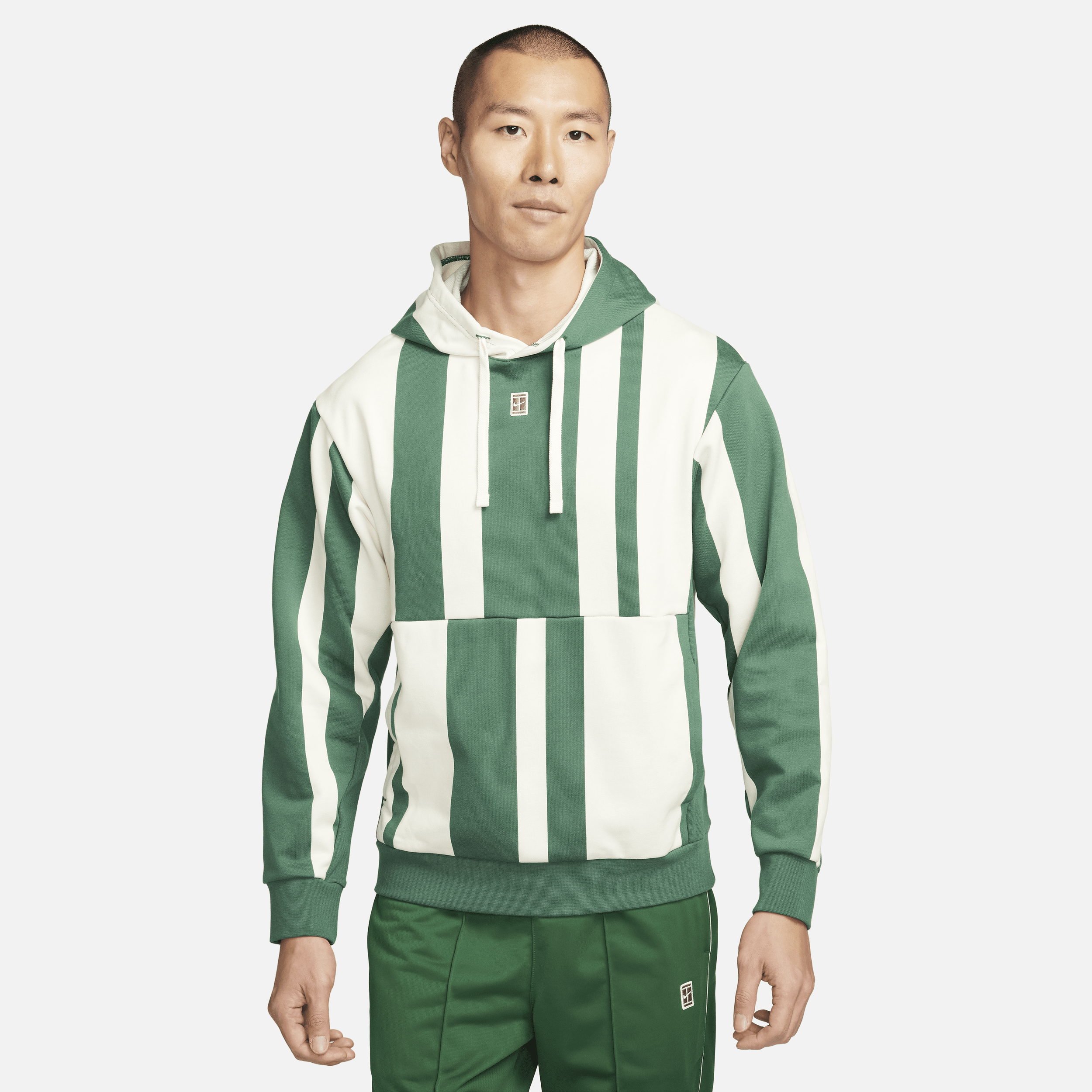 NikeCourt Heritage Dri-FIT-tennishættetrøje i fleece til mænd - grøn