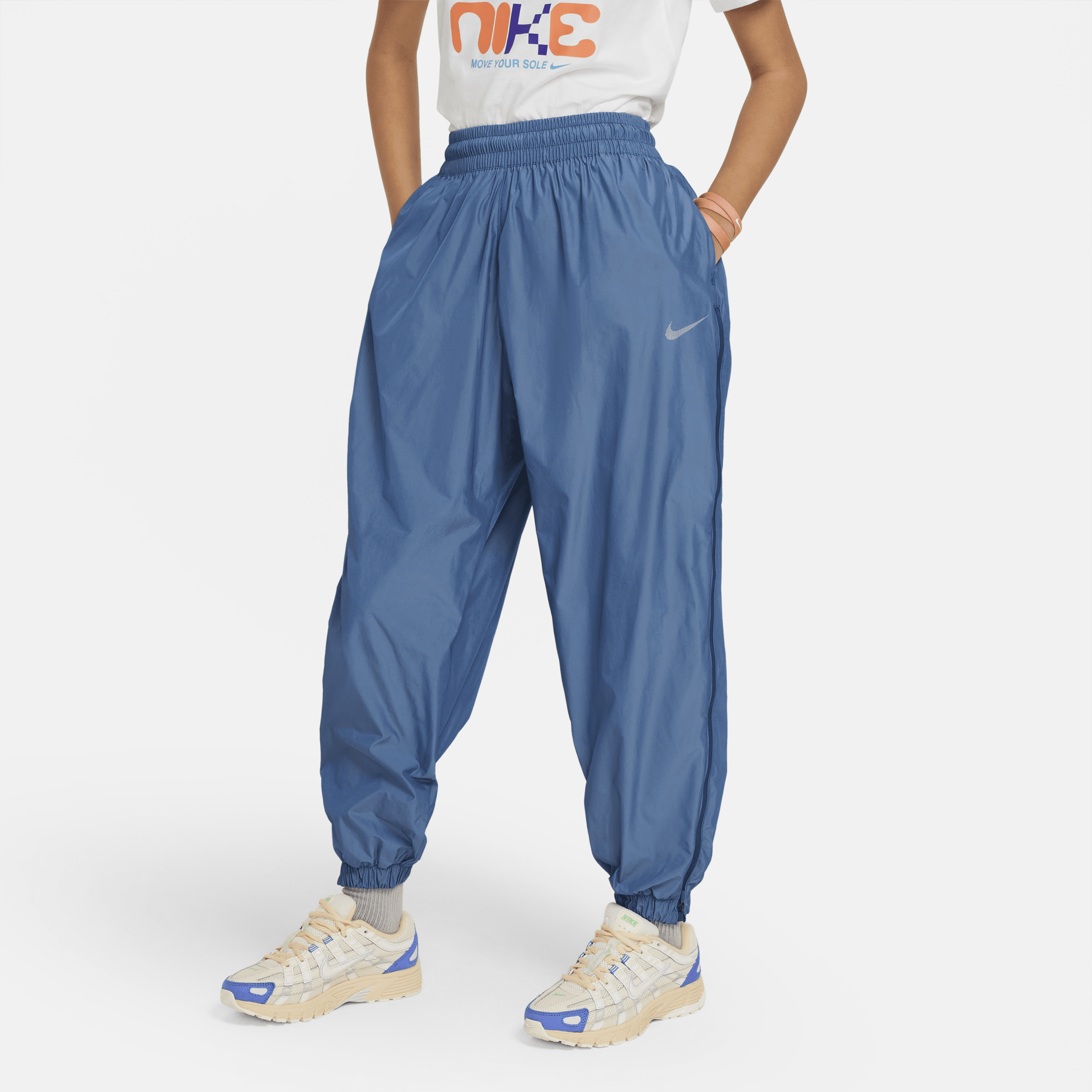 Vævede Nike Sportswear-bukser til større børn (piger) - blå