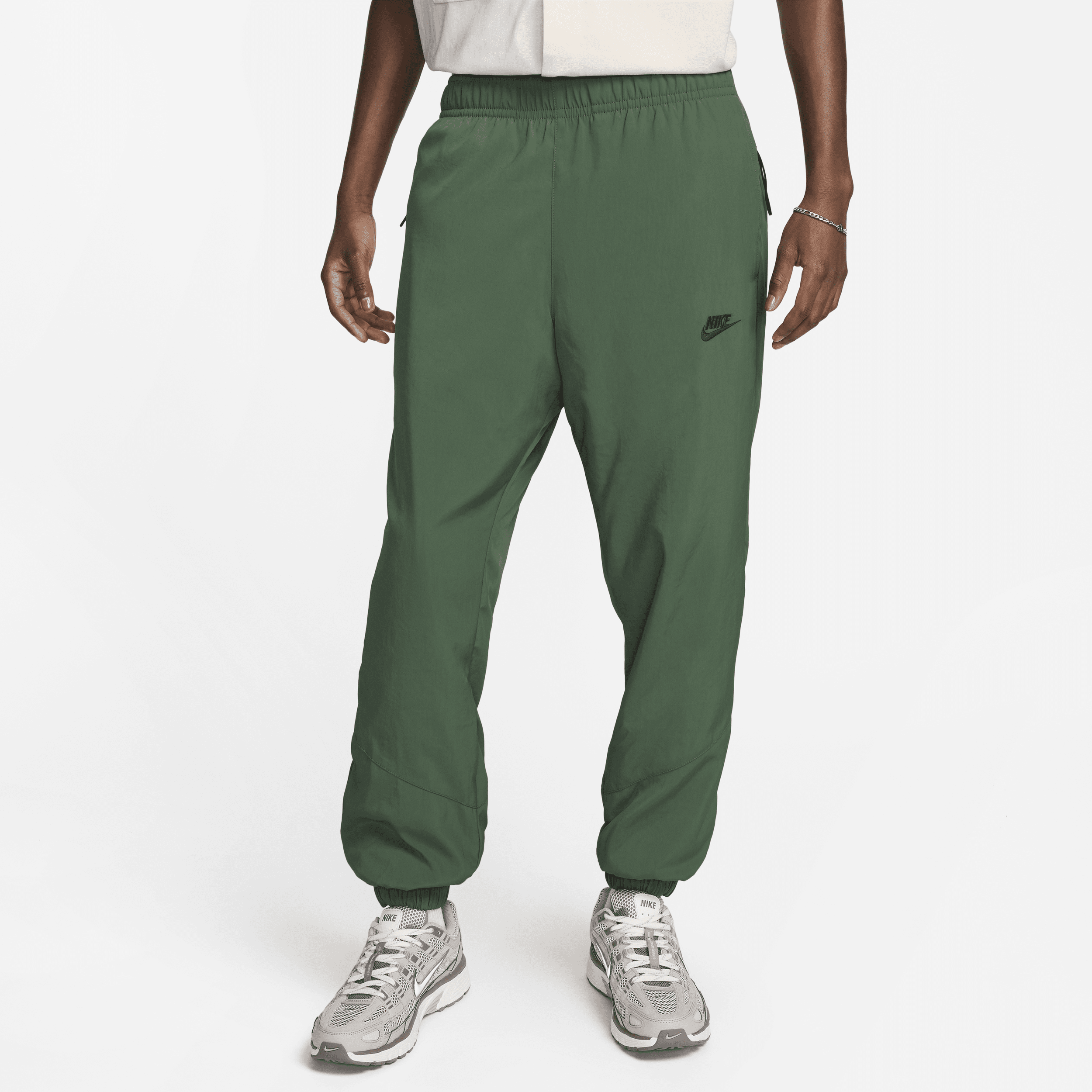 Nike Windrunner Pantalón de tejido Woven para el invierno - Hombre - Verde