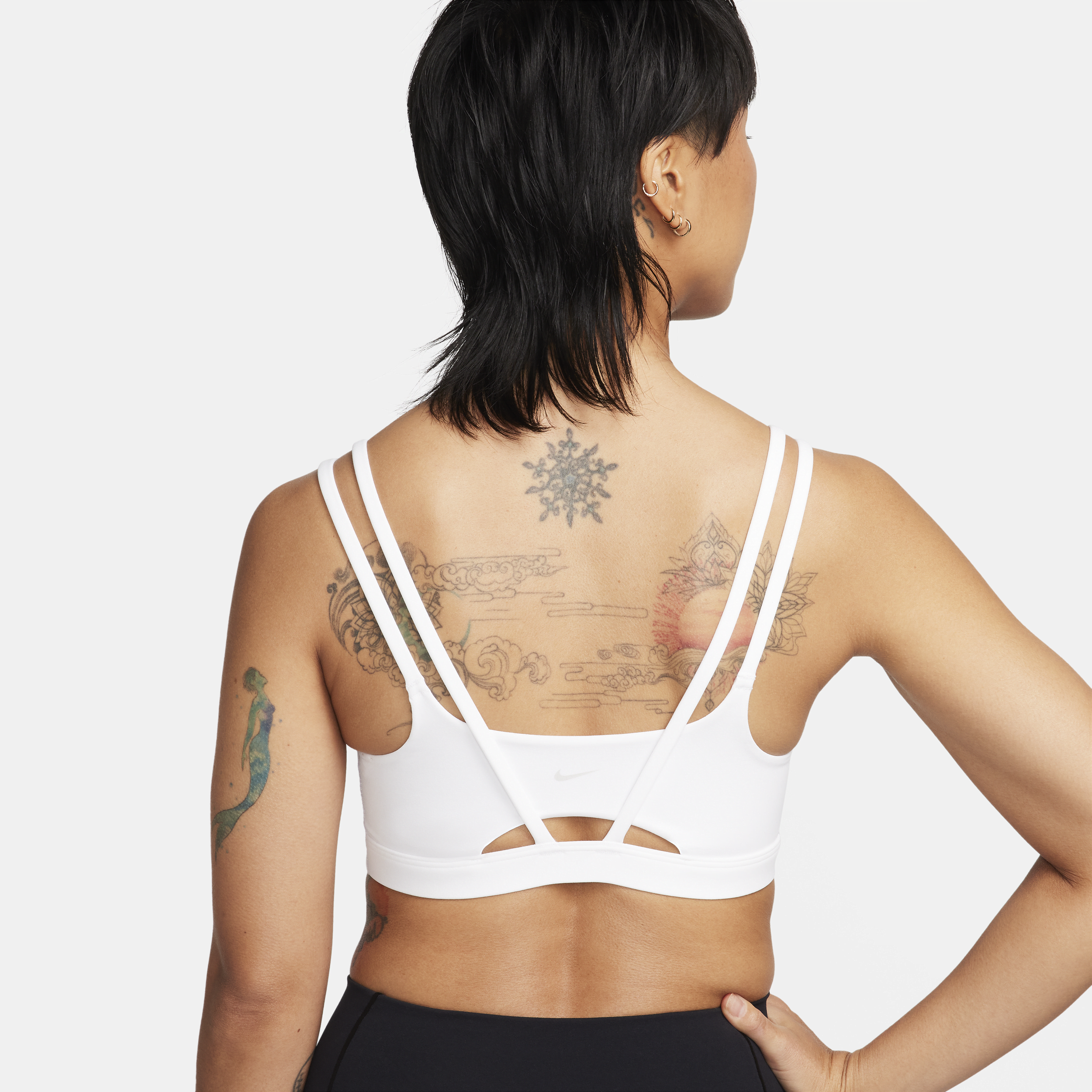 Nike Zenvy Strappy-sports-bh med let støtte og indlæg til kvinder - hvid