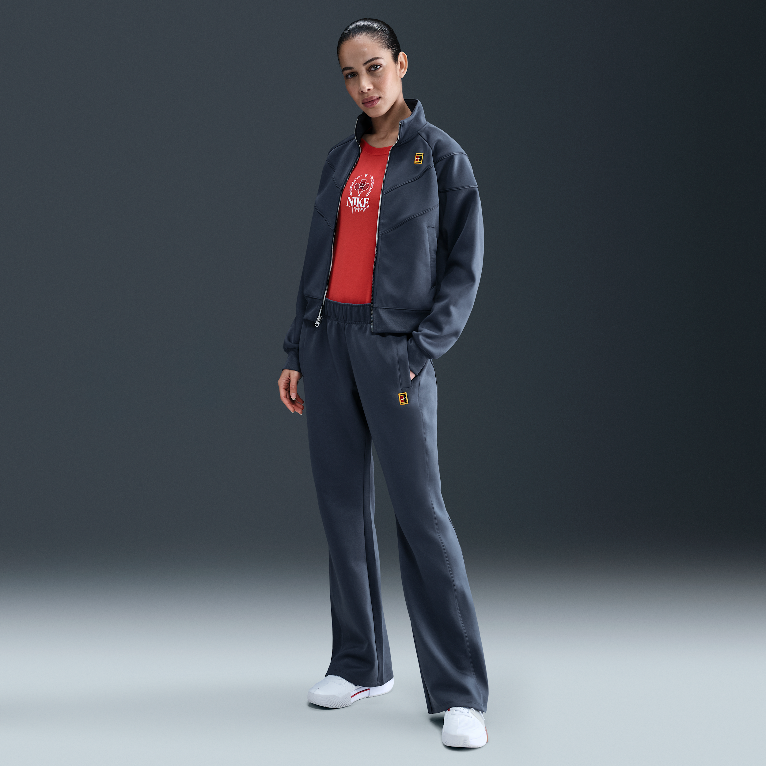 NikeCourt Heritage Windrunner Pantalón de tenis de talle medio - Mujer - Azul