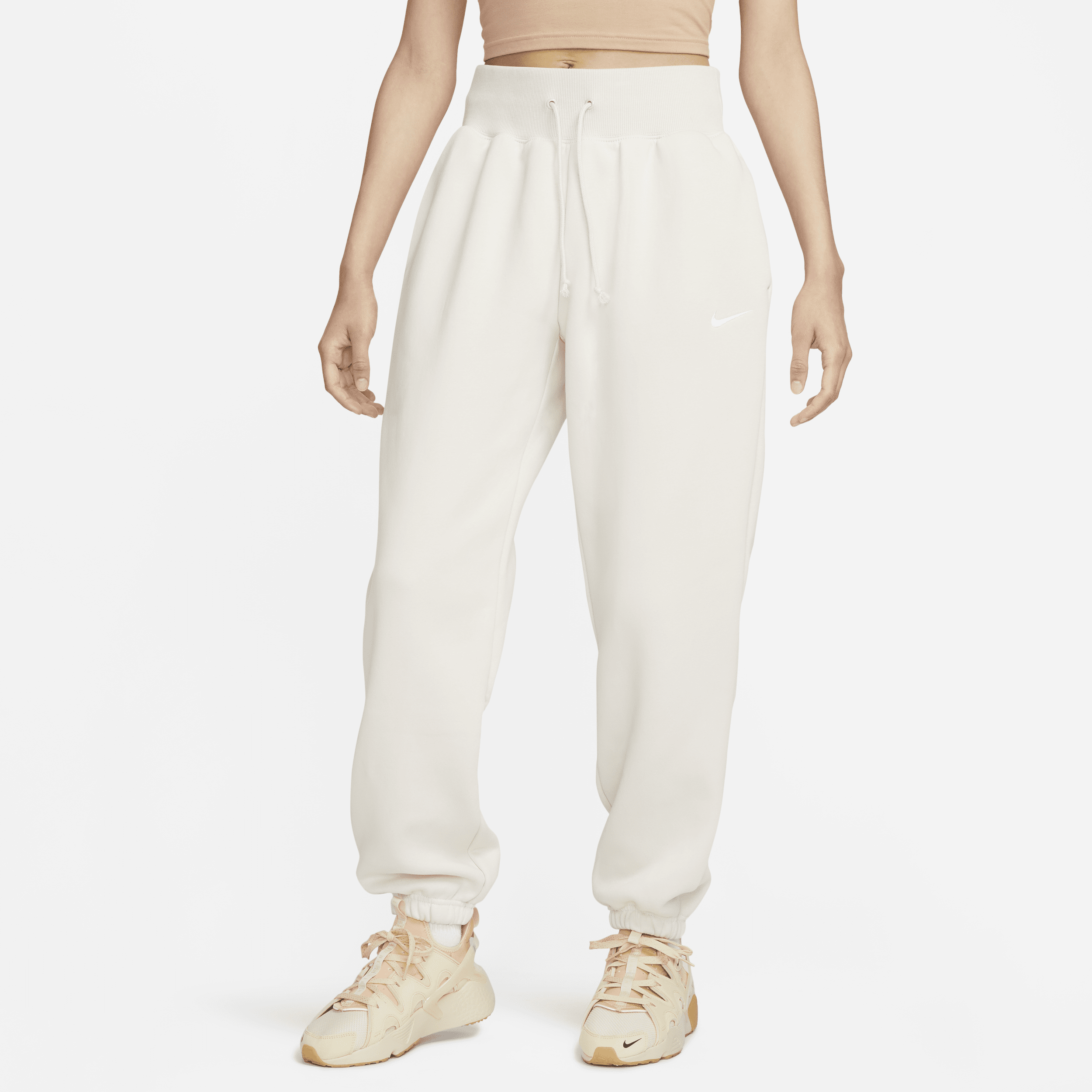 Overdimensionerede Nike Sportswear Phoenix Fleece-sweatpants med høj talje til kvinder - brun