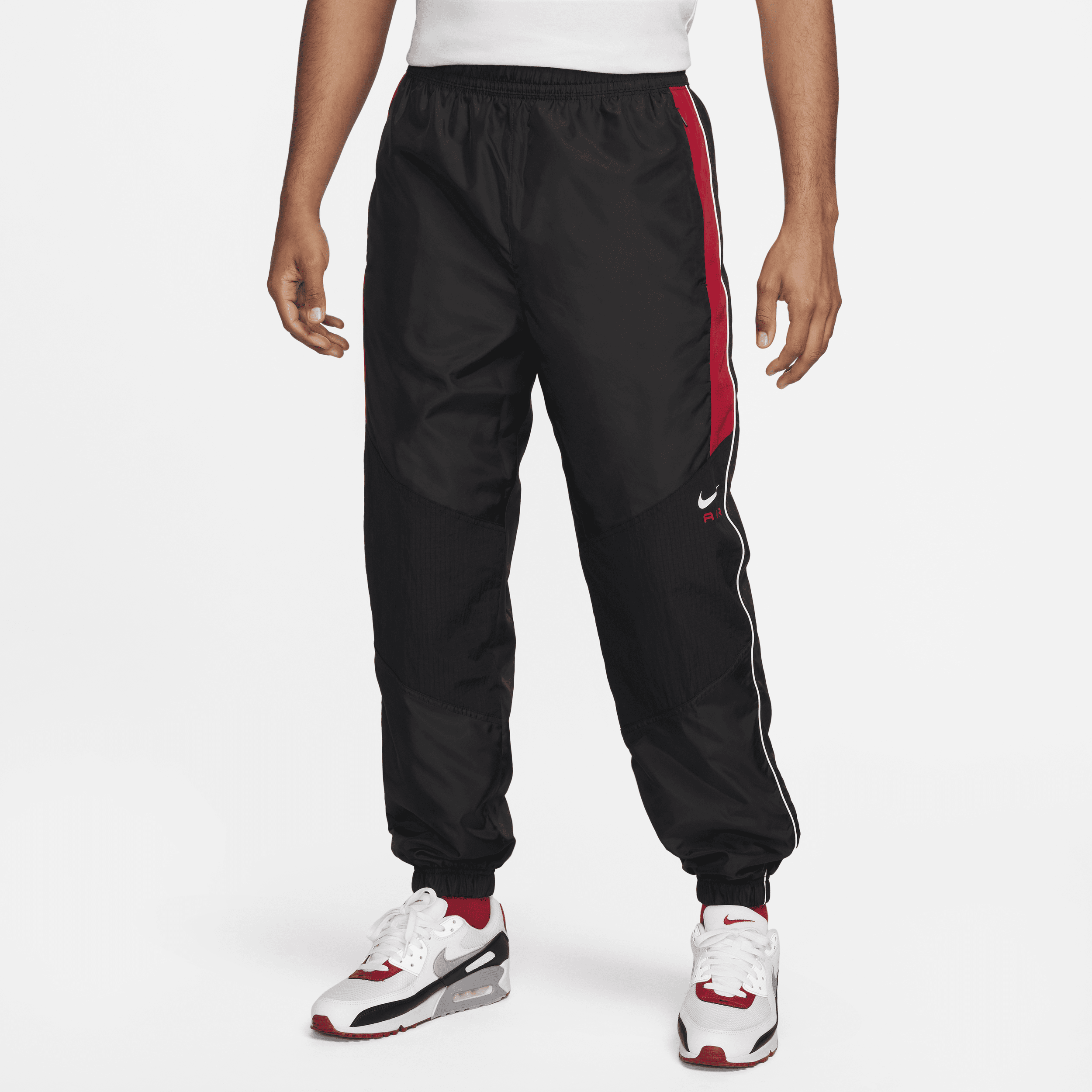 Pantaloni in tessuto Nike Air – Uomo - Nero