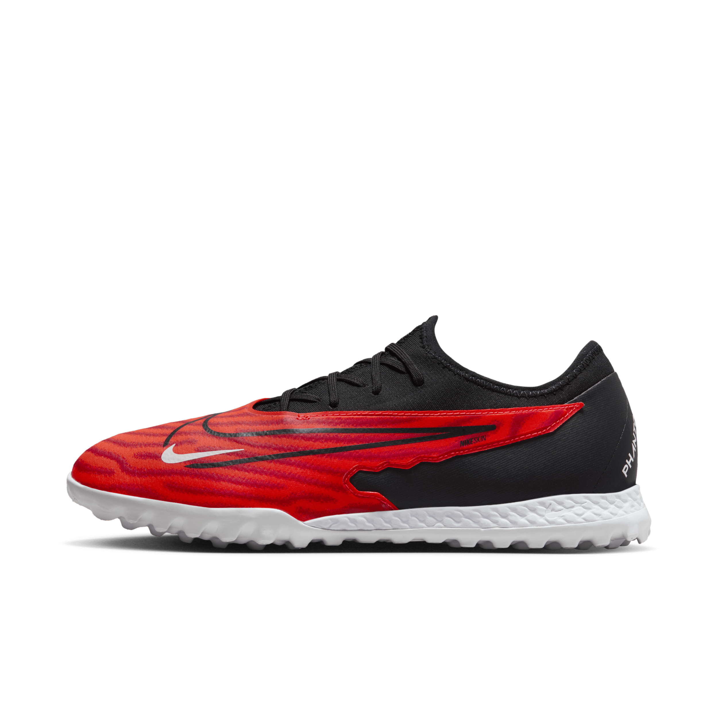Nike Phantom GX Pro-fodboldsko (low-top) til grus - rød