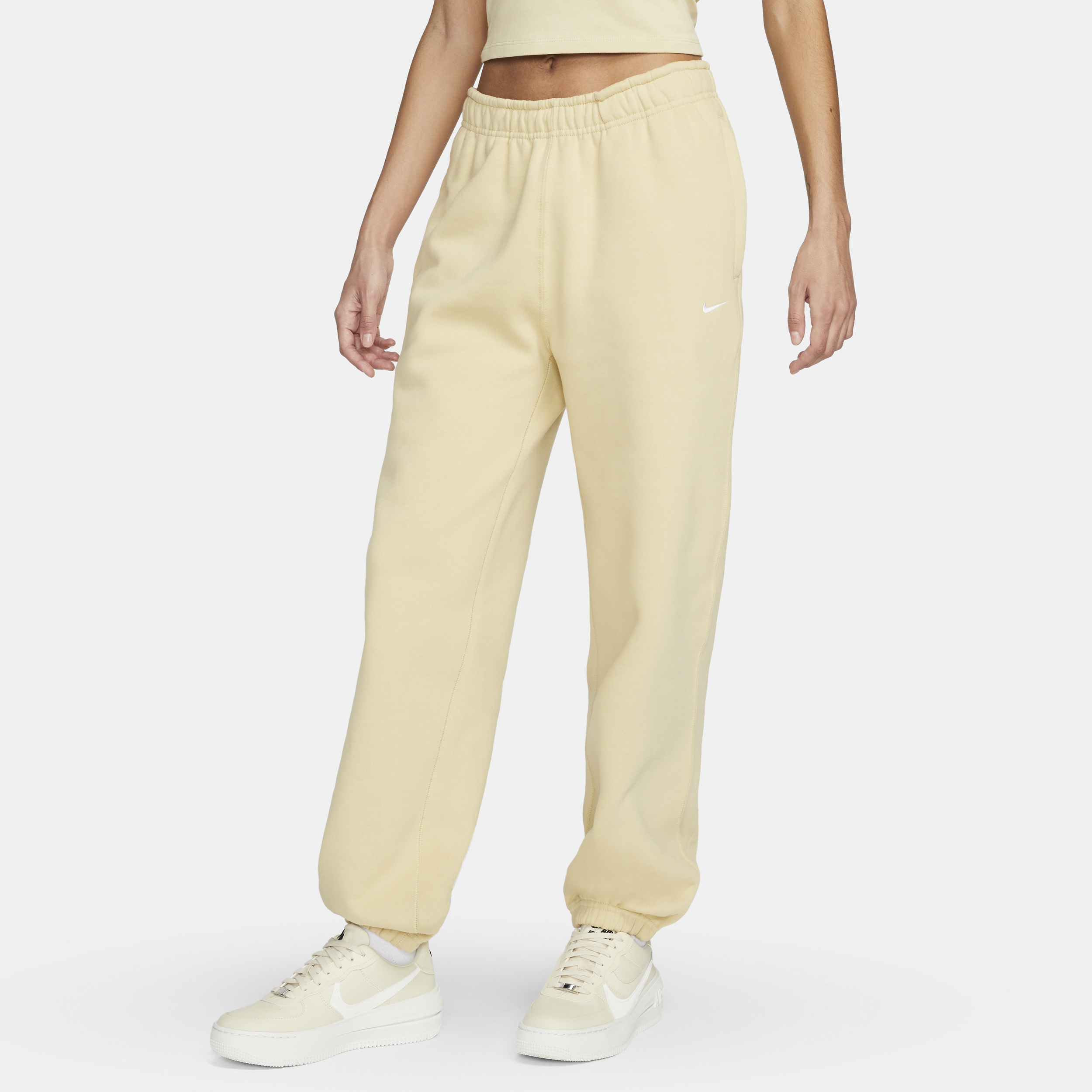 Nike Solo Swoosh Pantalón de tejido Fleece - Mujer - Marrón