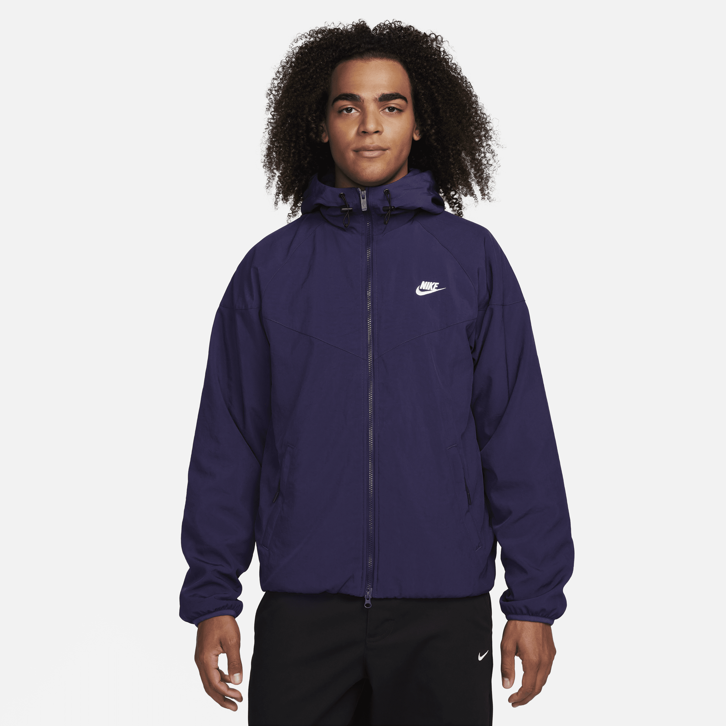 Løstsiddende Nike Sportswear Windrunner-jakke med hætte til mænd - lilla