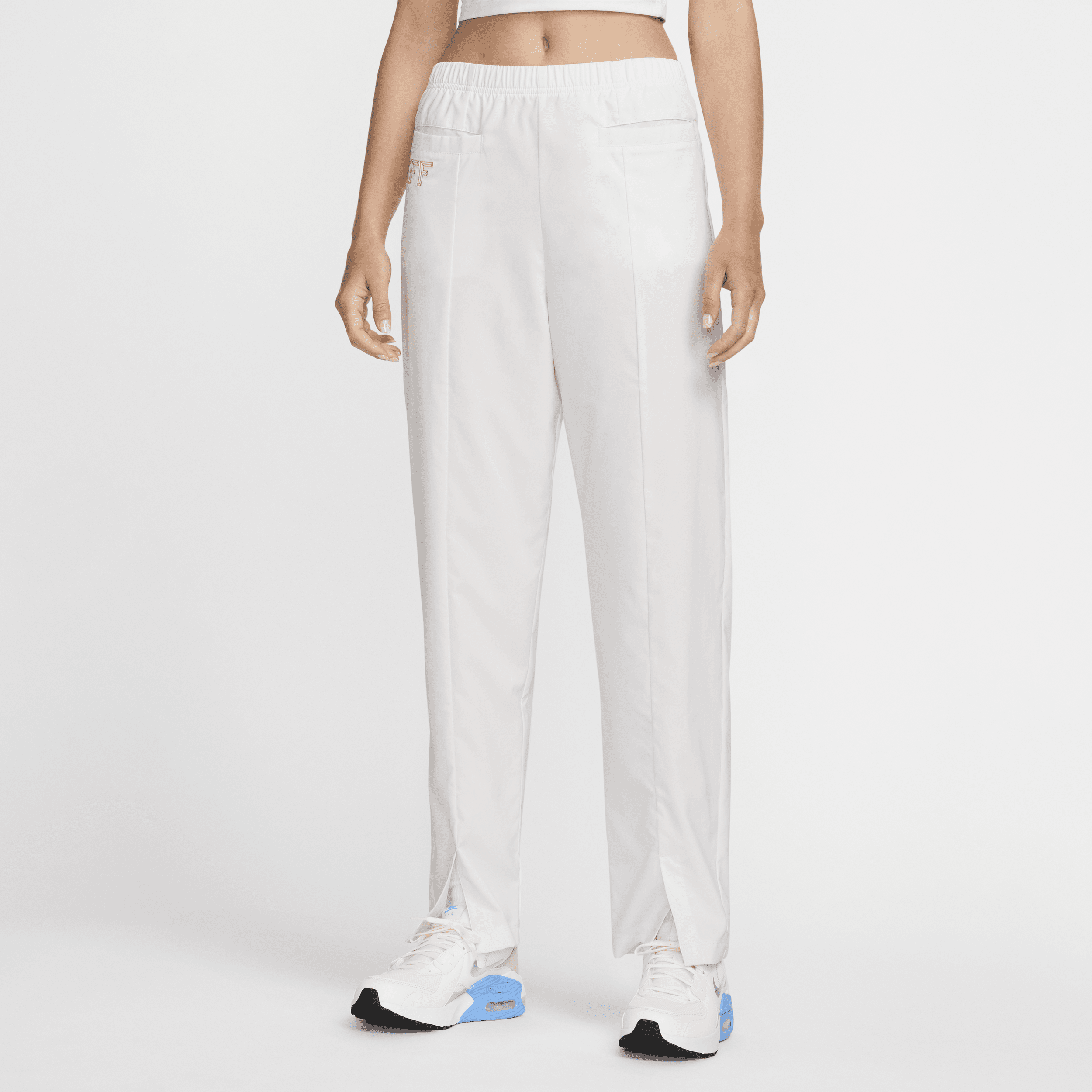 Pantaloni da calcio in tessuto a vita alta Nike Dri-FIT FFF Tech Pack – Donna - Bianco