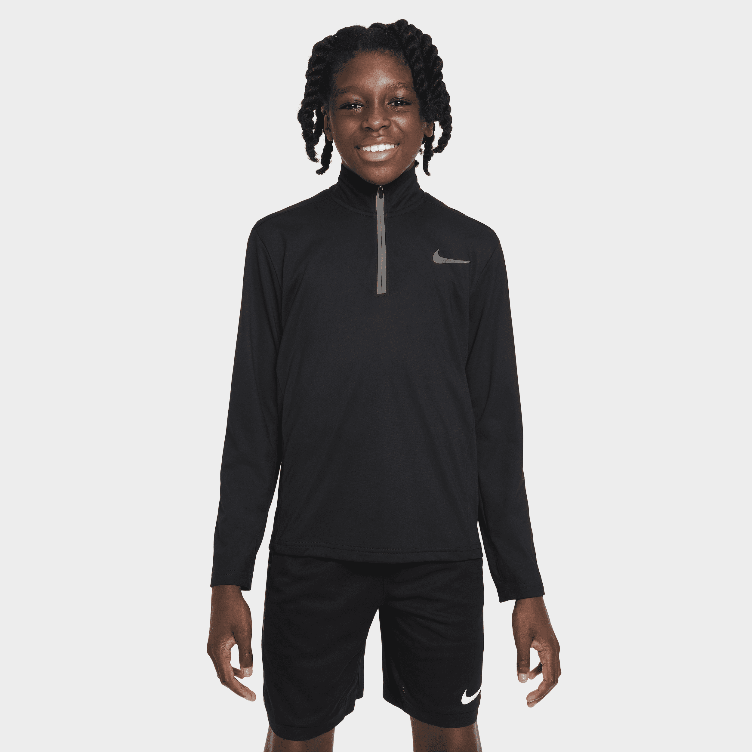 Nike Dri-FIT Poly -træningsoverdel med 1/4 lynlås til større børn (drenge) - sort