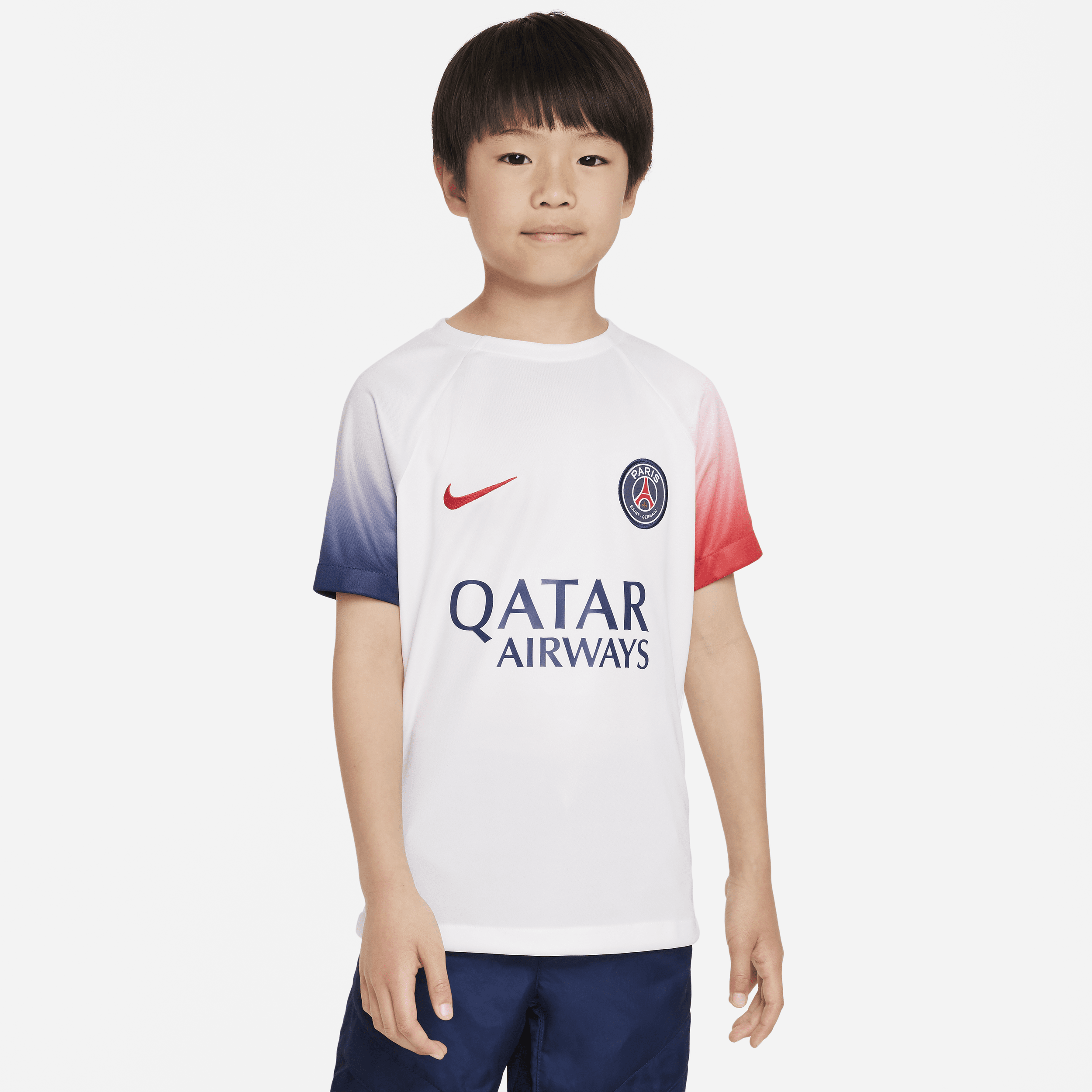 Paris Saint-Germain Academy Pro Away-Nike Dri-FIT Pre-Match-fodboldtrøje-til større børn - hvid