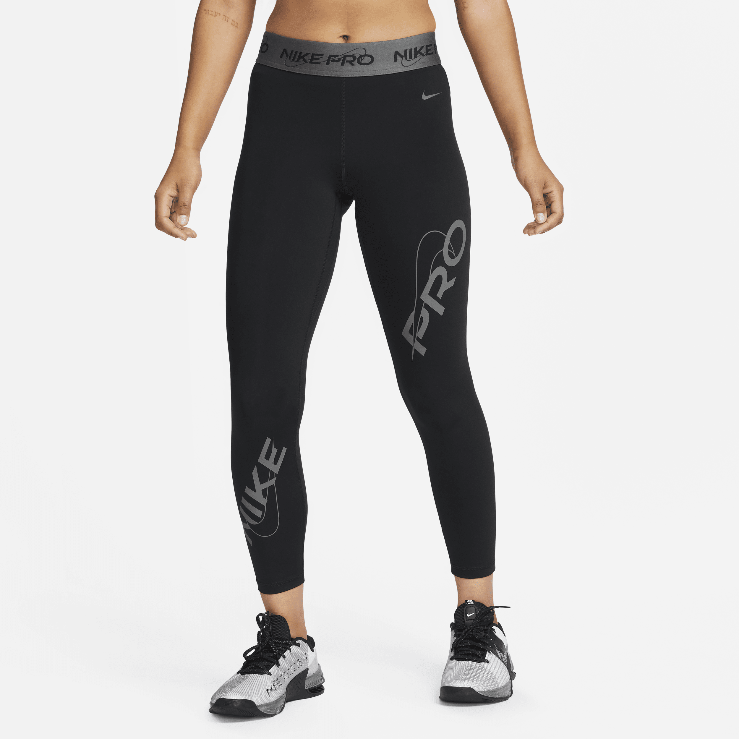 Nike Pro-7/8-leggings med grafik og mellemhøj talje til kvinder - sort