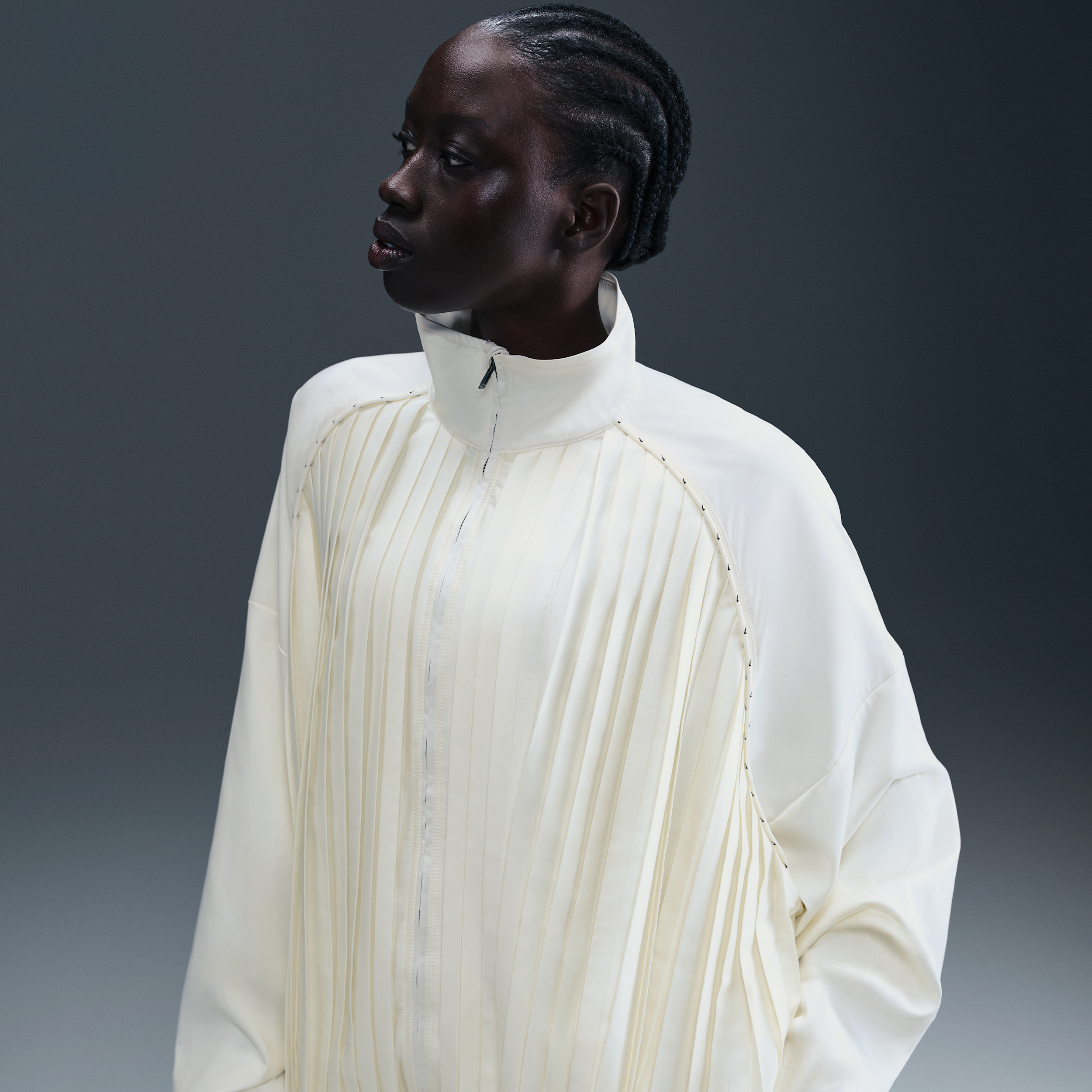 Track jacket plissettata Nike Collection – Donna - Bianco