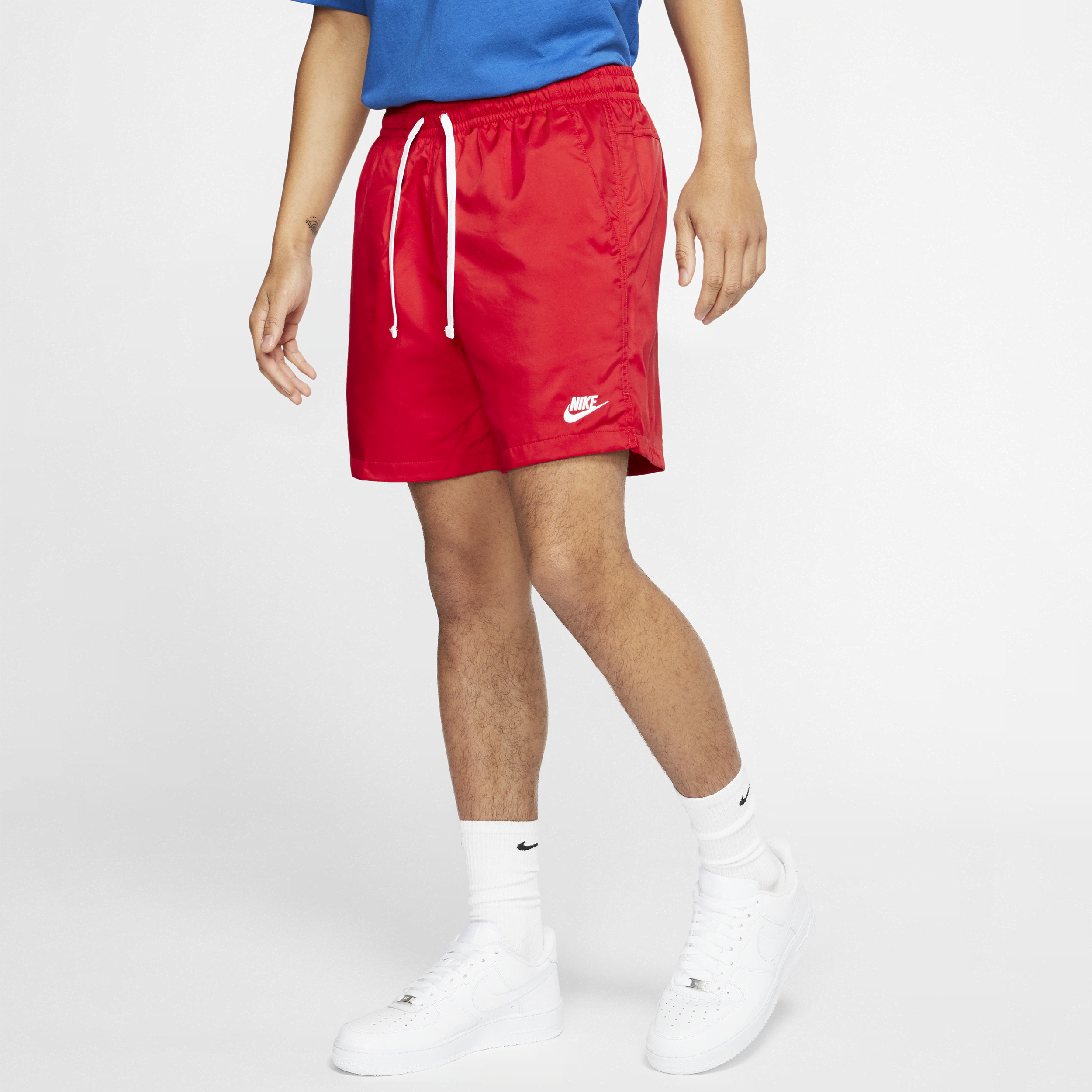 Vævede Nike Sportswear-Flow-shorts til mænd - rød