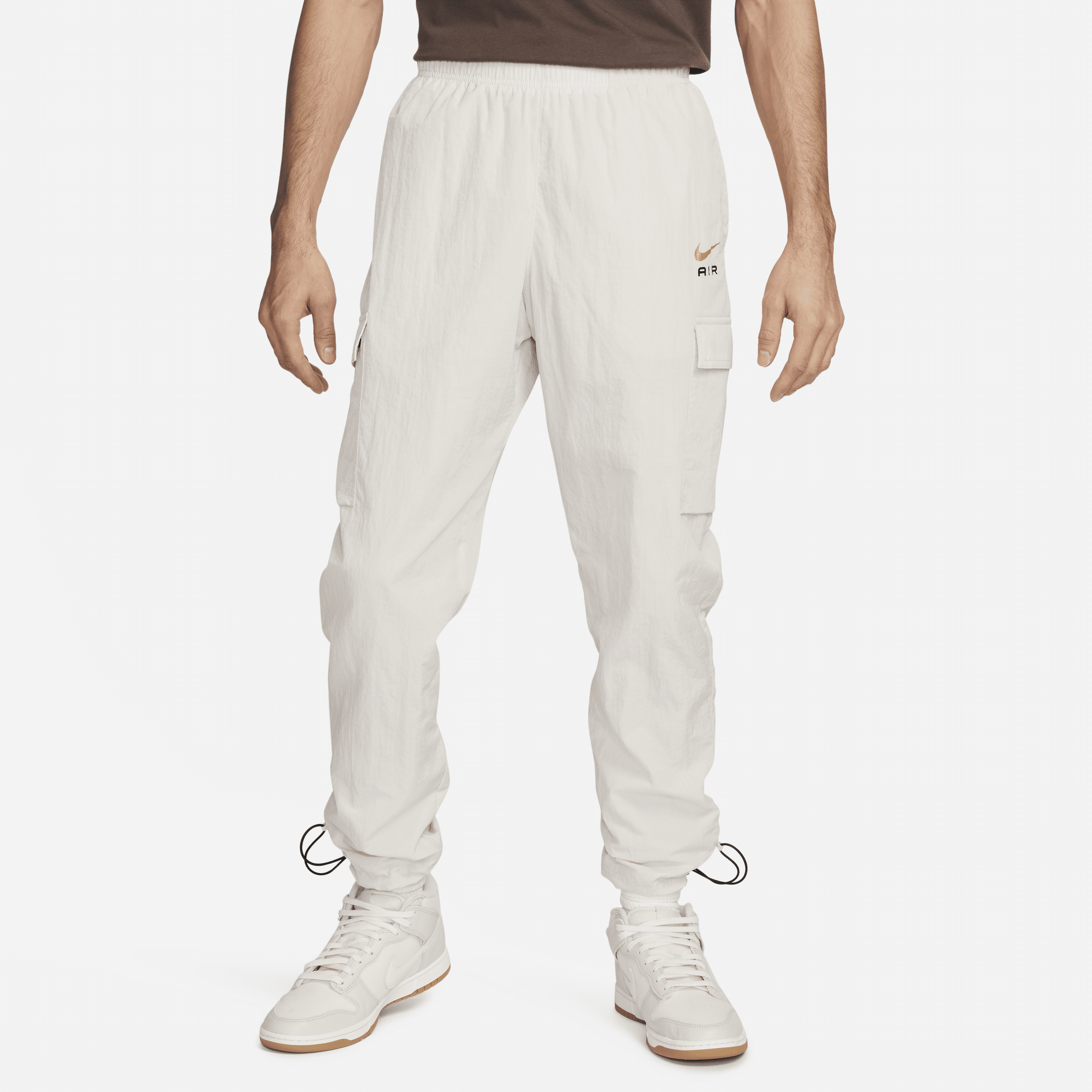 Pantaloni leggeri in tessuto Nike Air – Uomo - Marrone