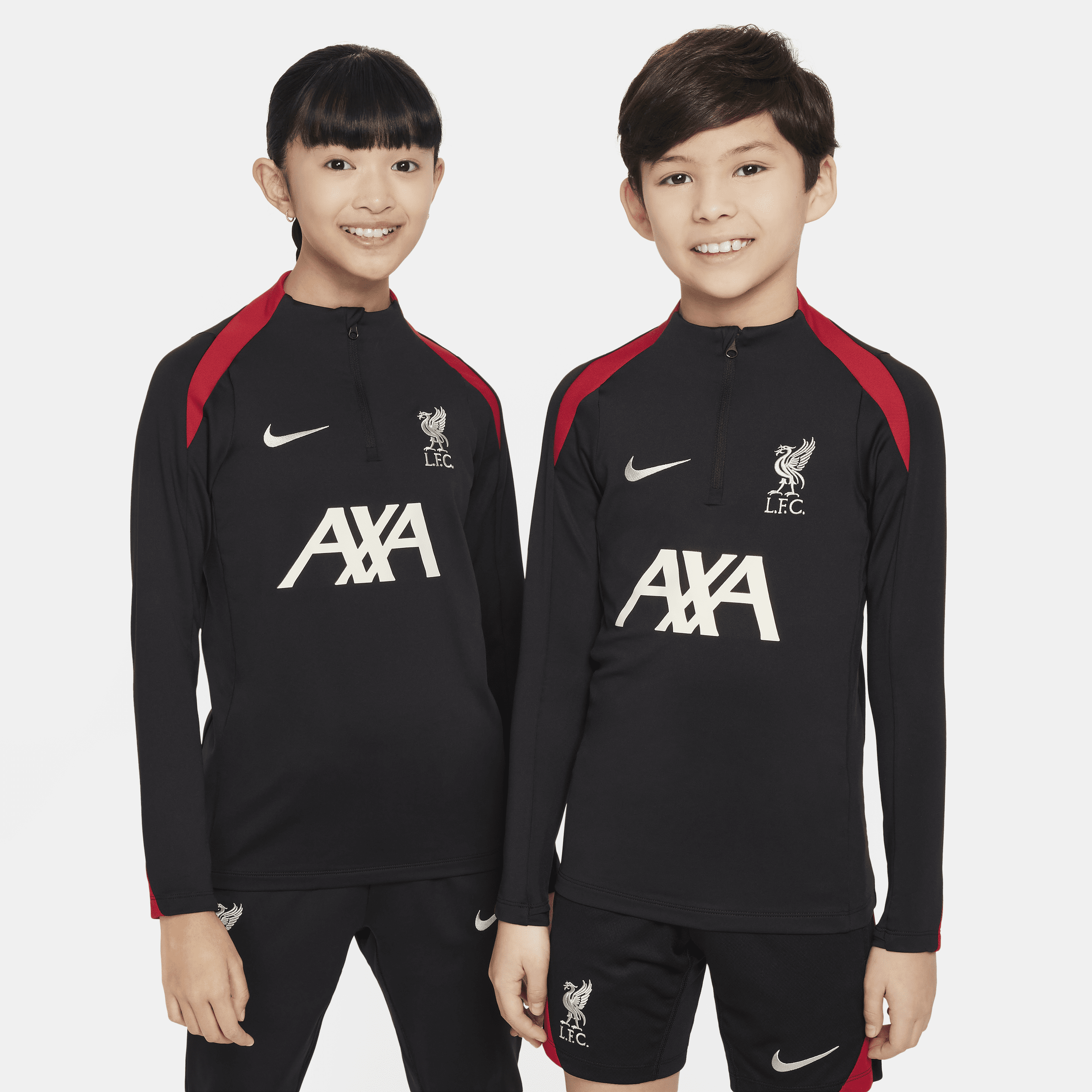 Liverpool FC Strike Nike Dri-FIT-fodboldtræningstrøje til større børn - sort