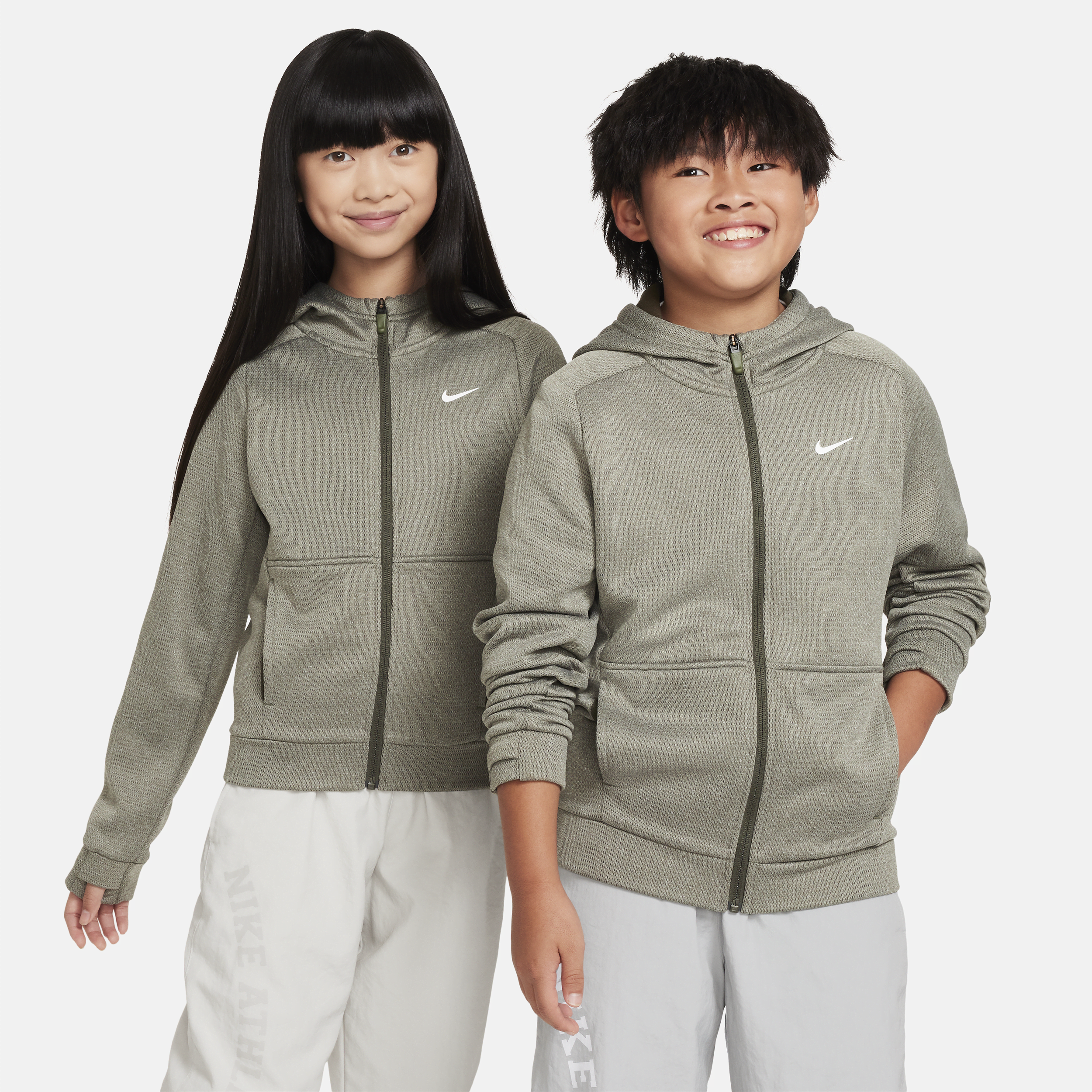 Nike Therma-FIT-hættetrøje med lynlås i fuld længde til større børn - grøn