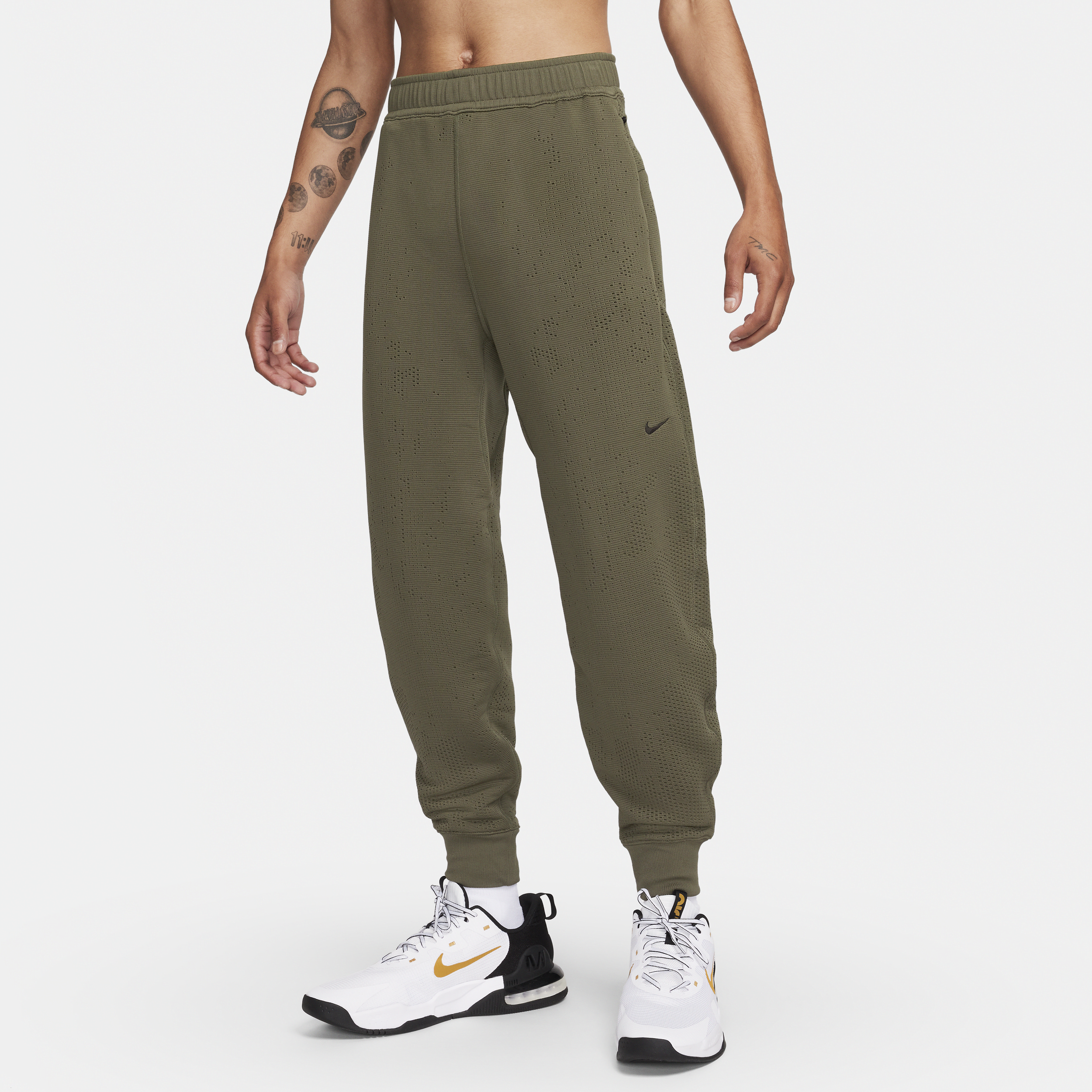Nike A.P.S. Alsidige Therma-FIT-bukser til mænd - grøn