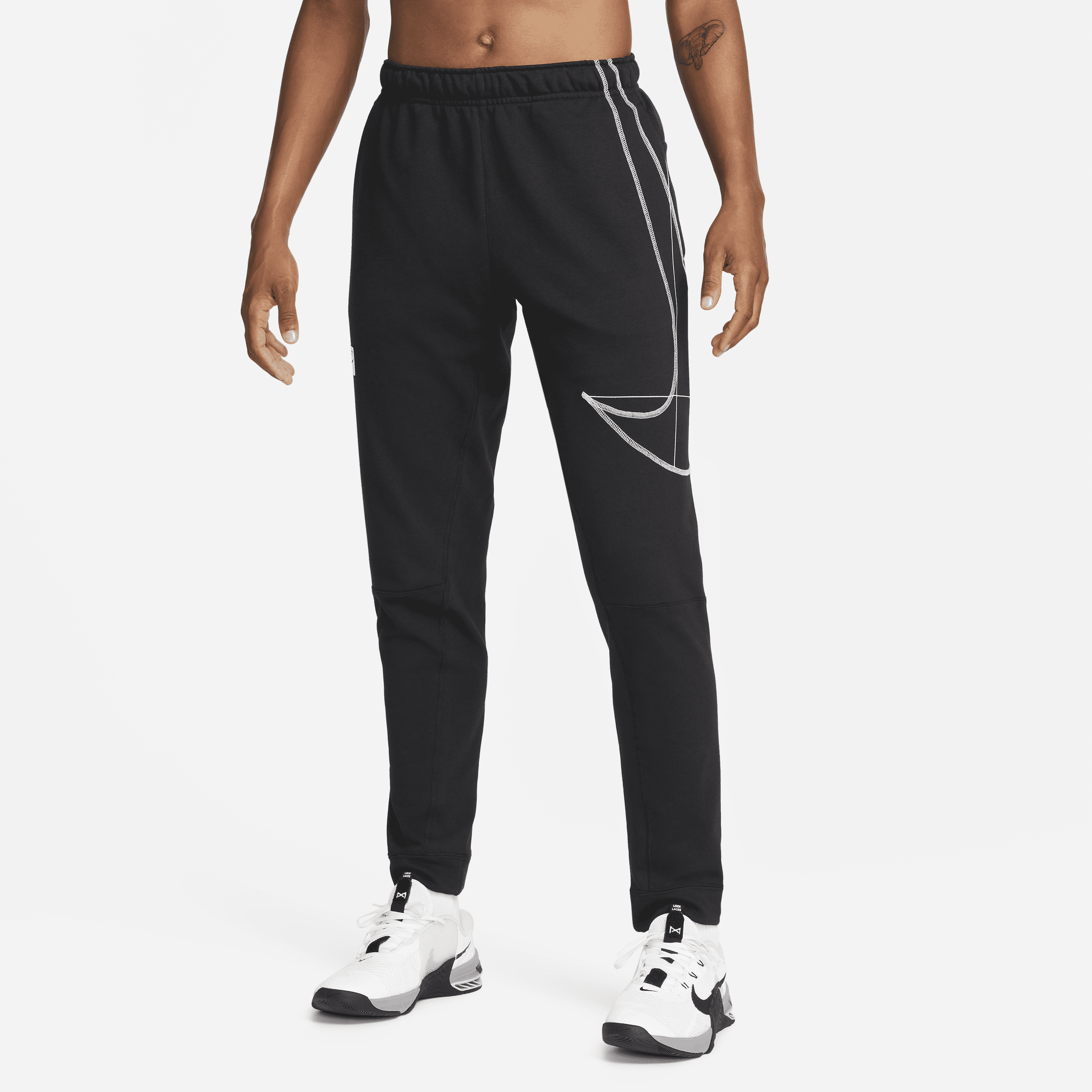 Nike Dri-FIT Pantalón de running de tejido Fleece entallado - Hombre - Negro