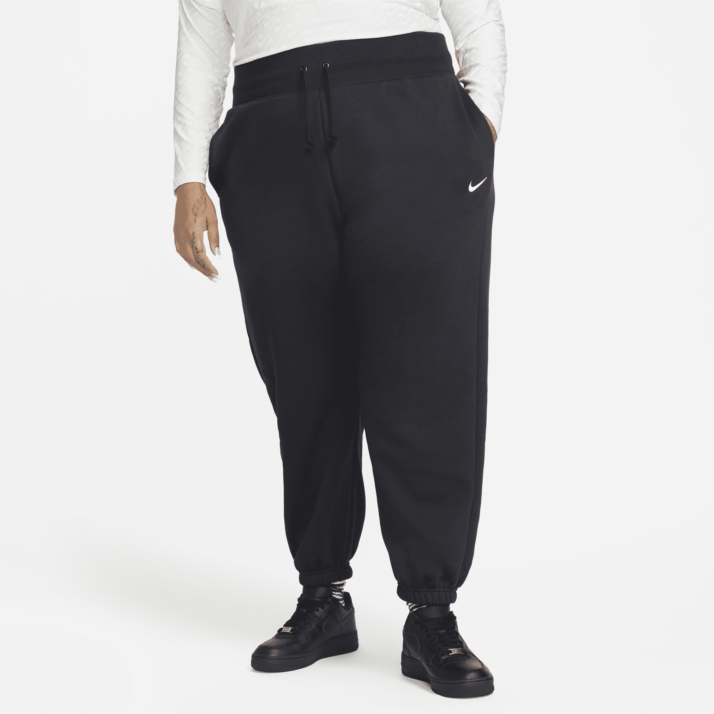 Overdimensionerede Nike Sportswear Phoenix Fleece-sweatpants med høj talje til kvinder (plus size) - sort