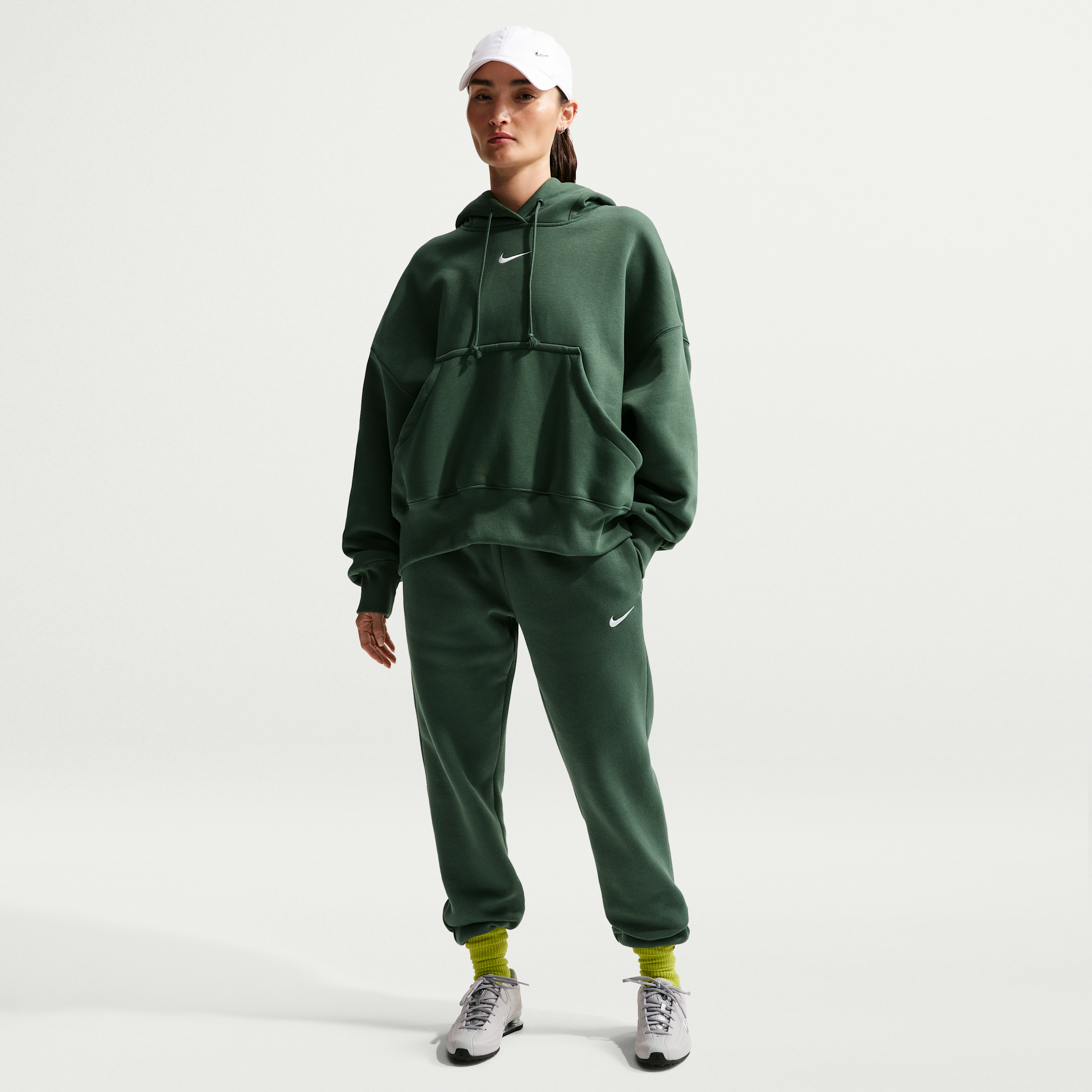 Pantaloni tuta a vita media Nike Phoenix Fleece – Donna - Verde