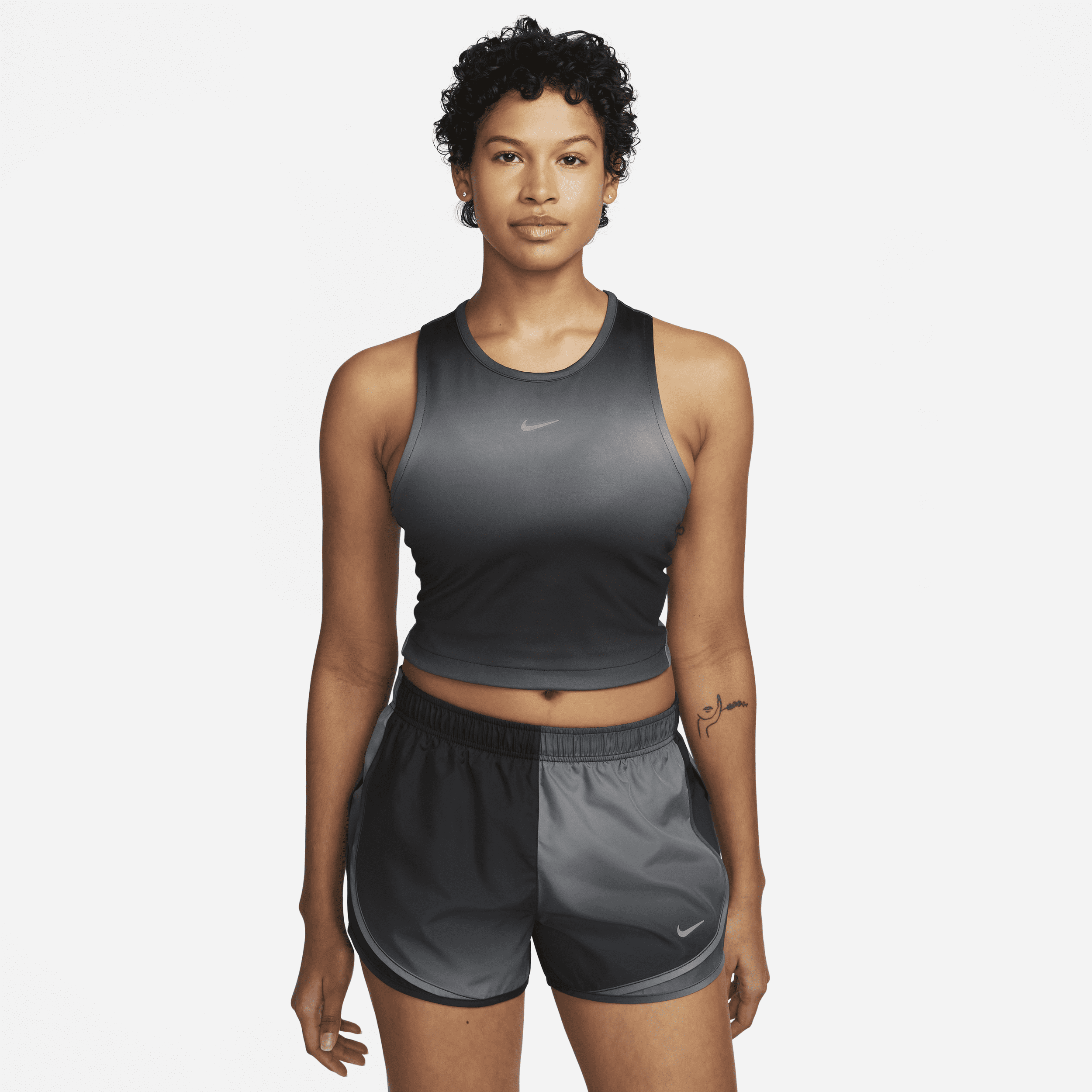 Nike Dri-FIT Swoosh Korte hardlooptanktop voor dames - Zwart