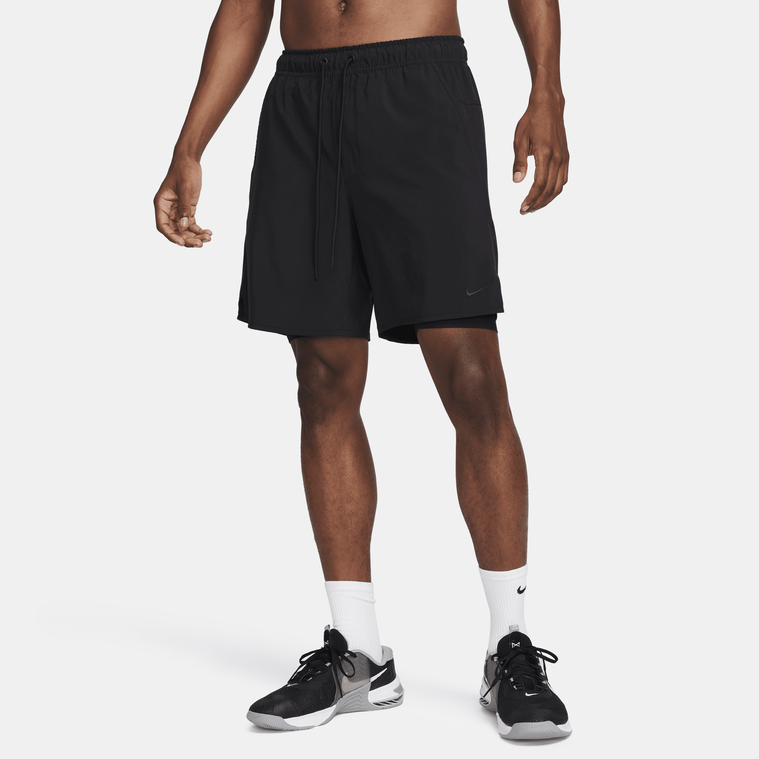 Nike Unlimited multifunctionele 2-in-1 herenshorts met Dri-FIT (18 cm) - Zwart