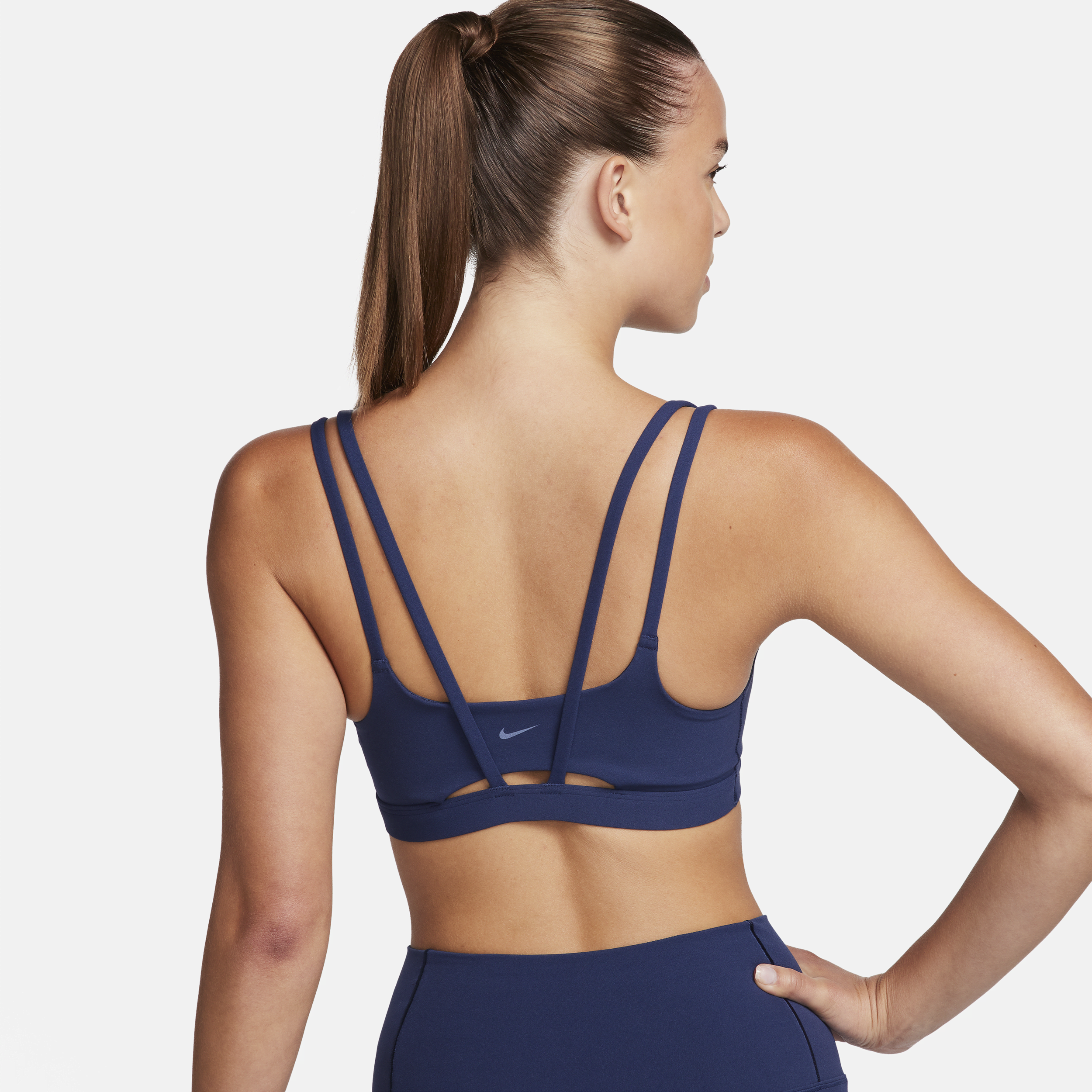 Nike Zenvy Strappy-sports-bh med let støtte og indlæg til kvinder - blå