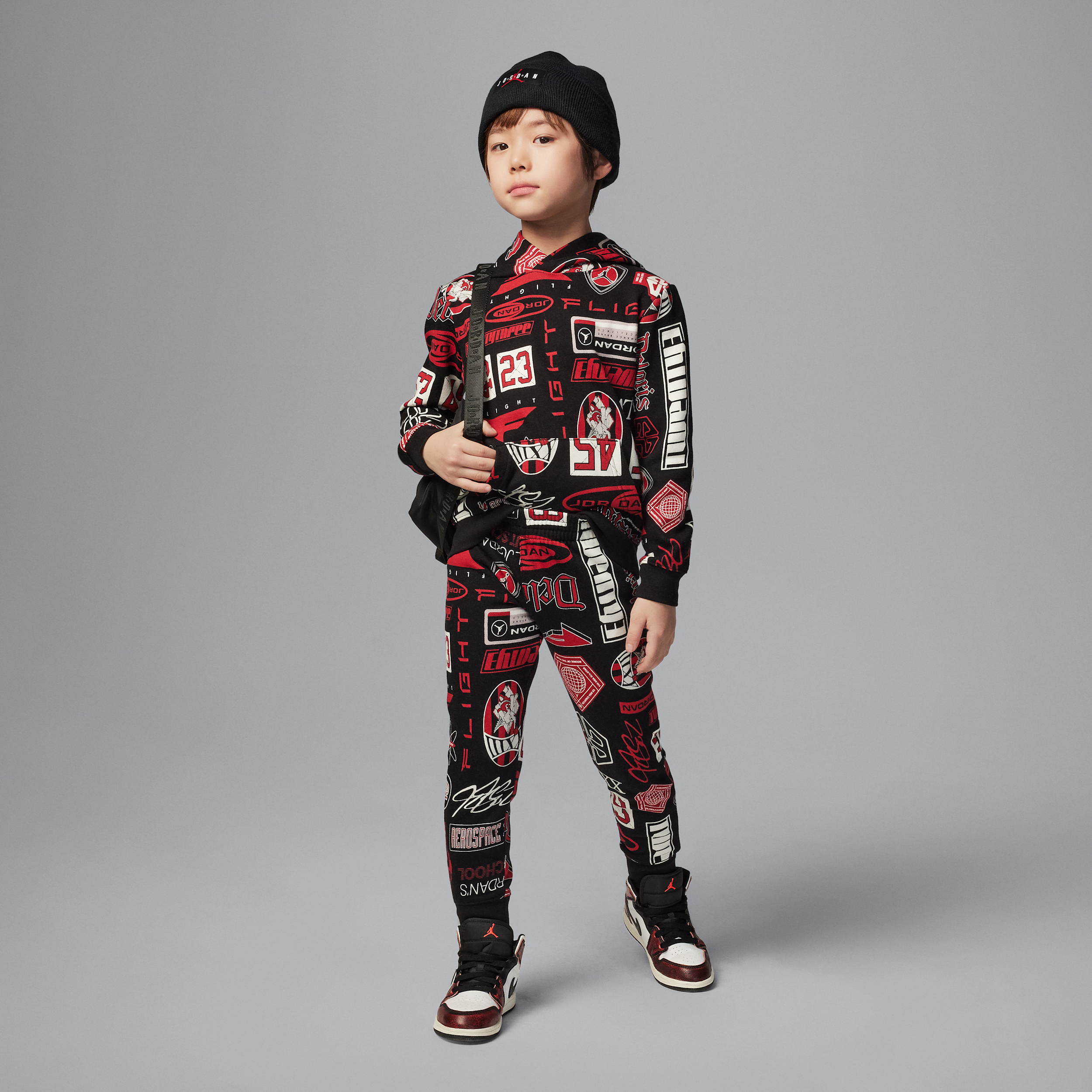 Nike Completo in 2 pezzi con felpa pullover Brooklyn in fleece stampata con cappuccio Jordan – Bambino/a - Nero