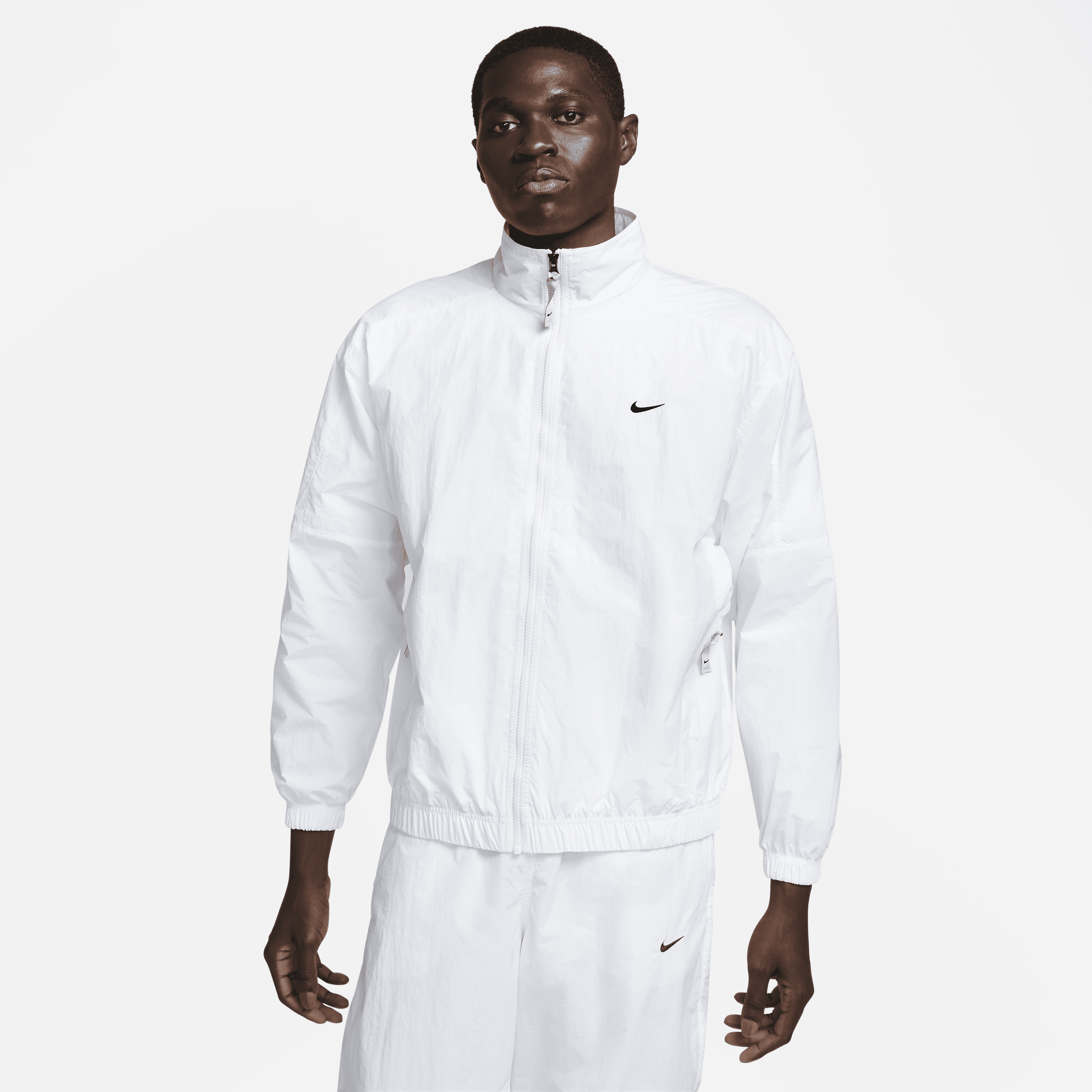 Nike Sportswear Solo Swoosh-løbejakke til mænd - hvid