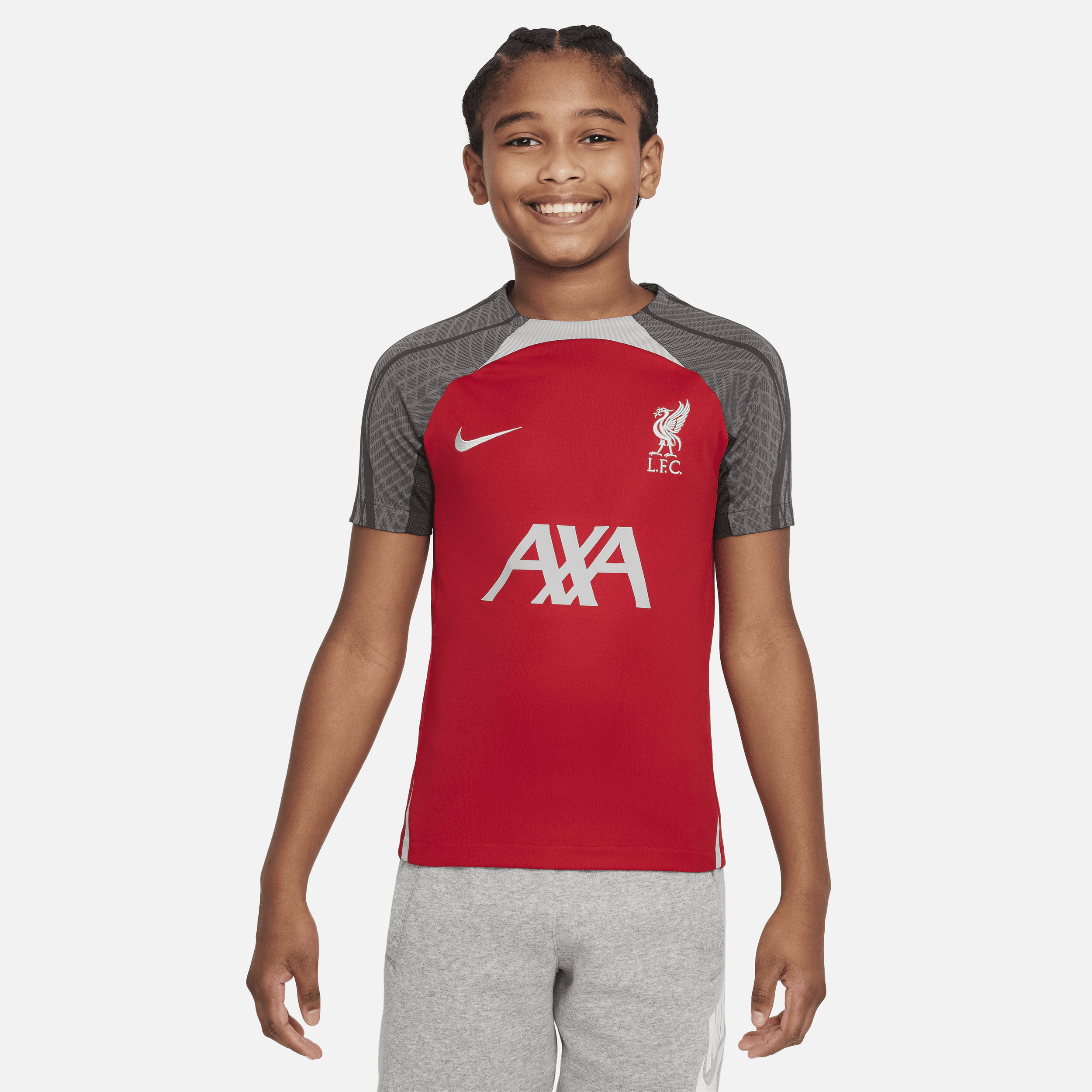 Maskinstrikket Liverpool FC Strike Nike Dri-FIT-fodboldtrøje til større børn - rød