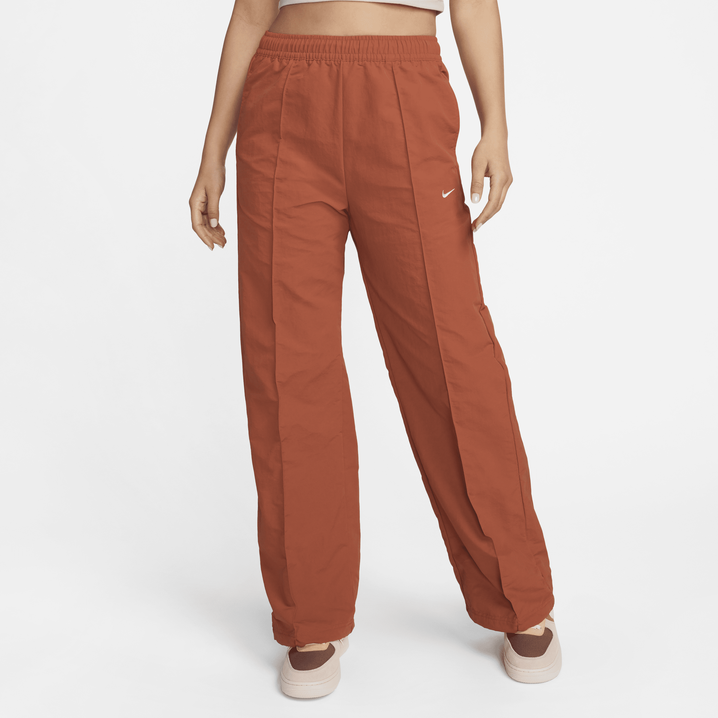 Nike Sportswear Everything Wovens Pantalón de talle medio con dobladillo abierto - Mujer - Naranja