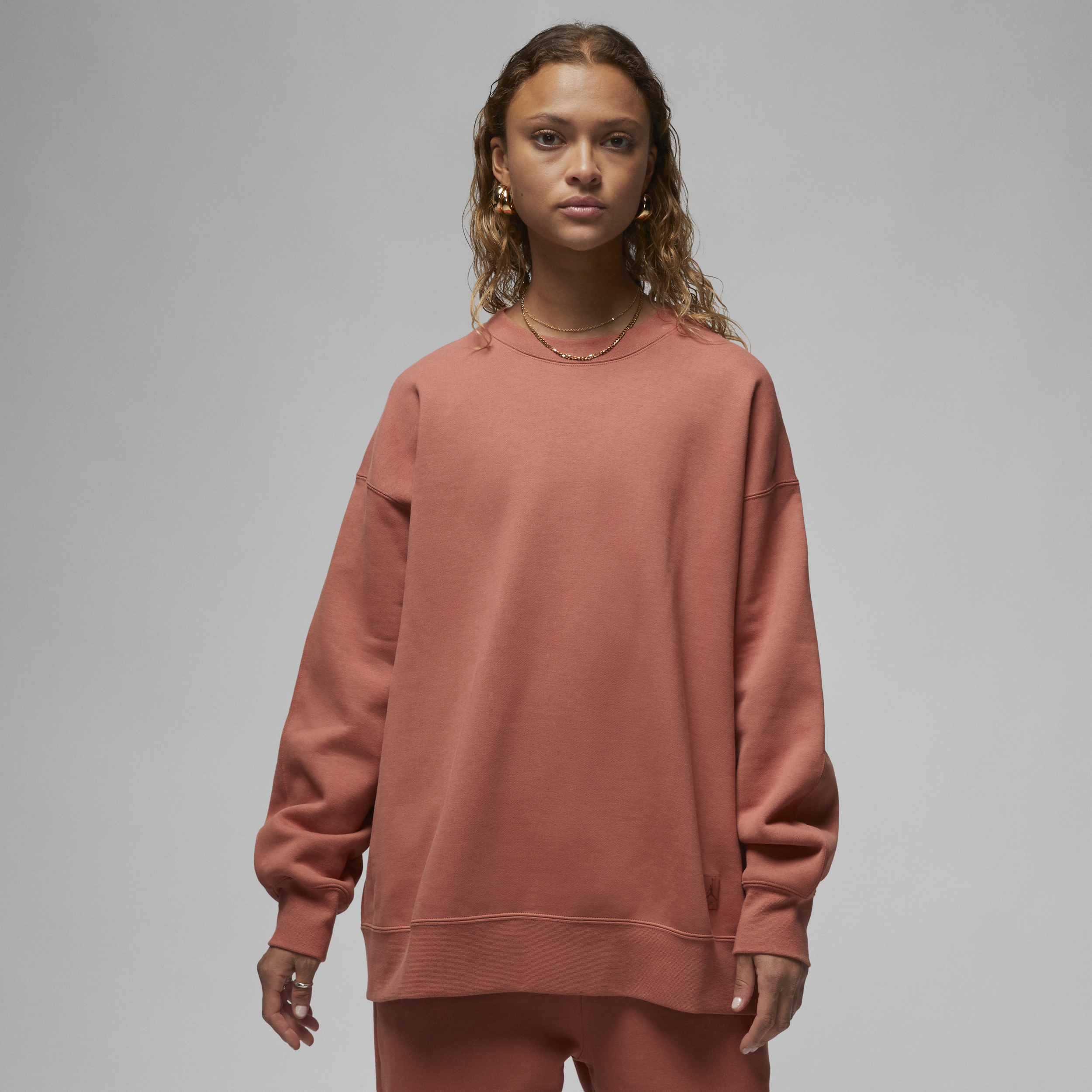Jordan Flight Fleece sweatshirt met ronde hals voor dames - Oranje