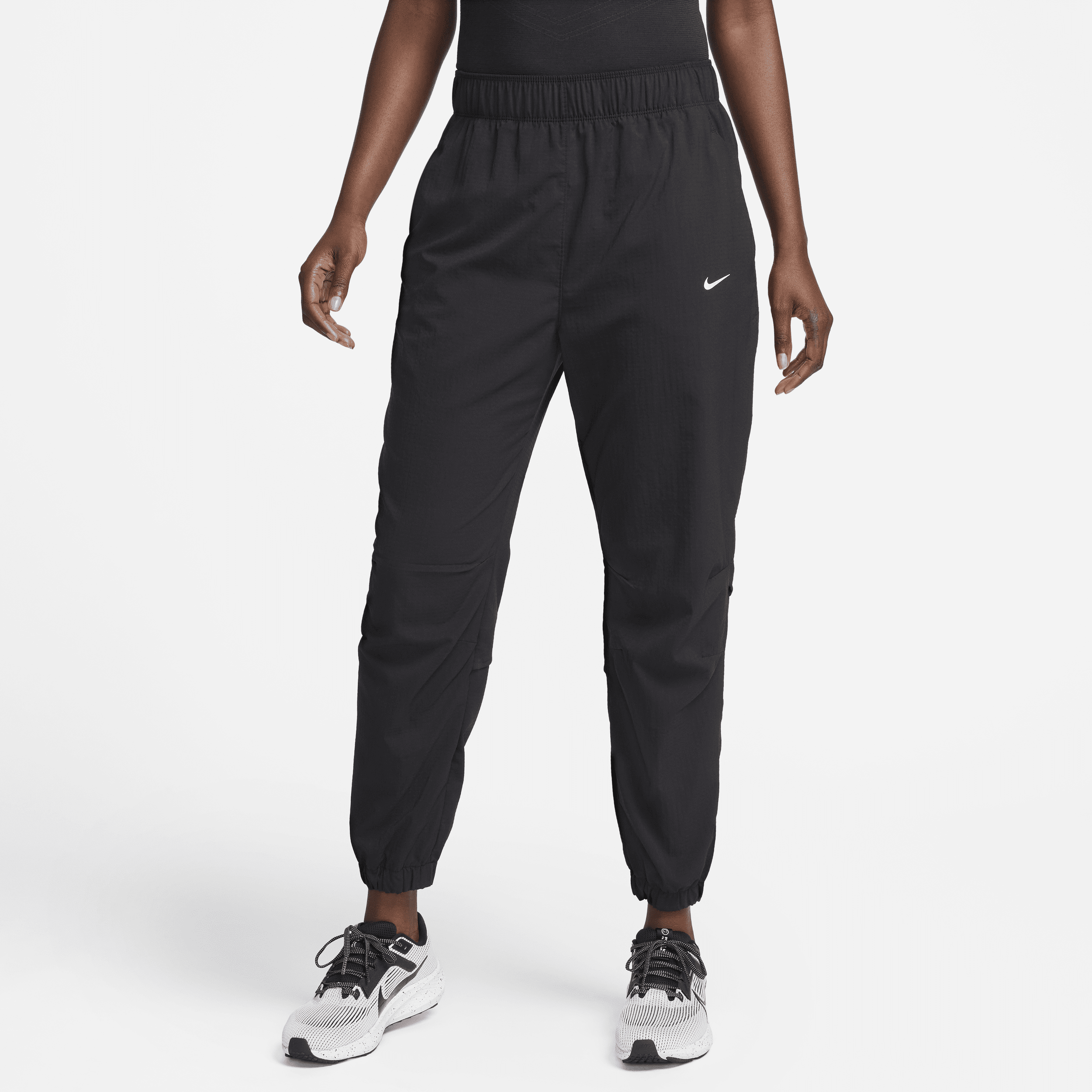Pantaloni da running da riscaldamento a 7/8 a vita media Nike Dri-FIT Fast – Donna - Nero