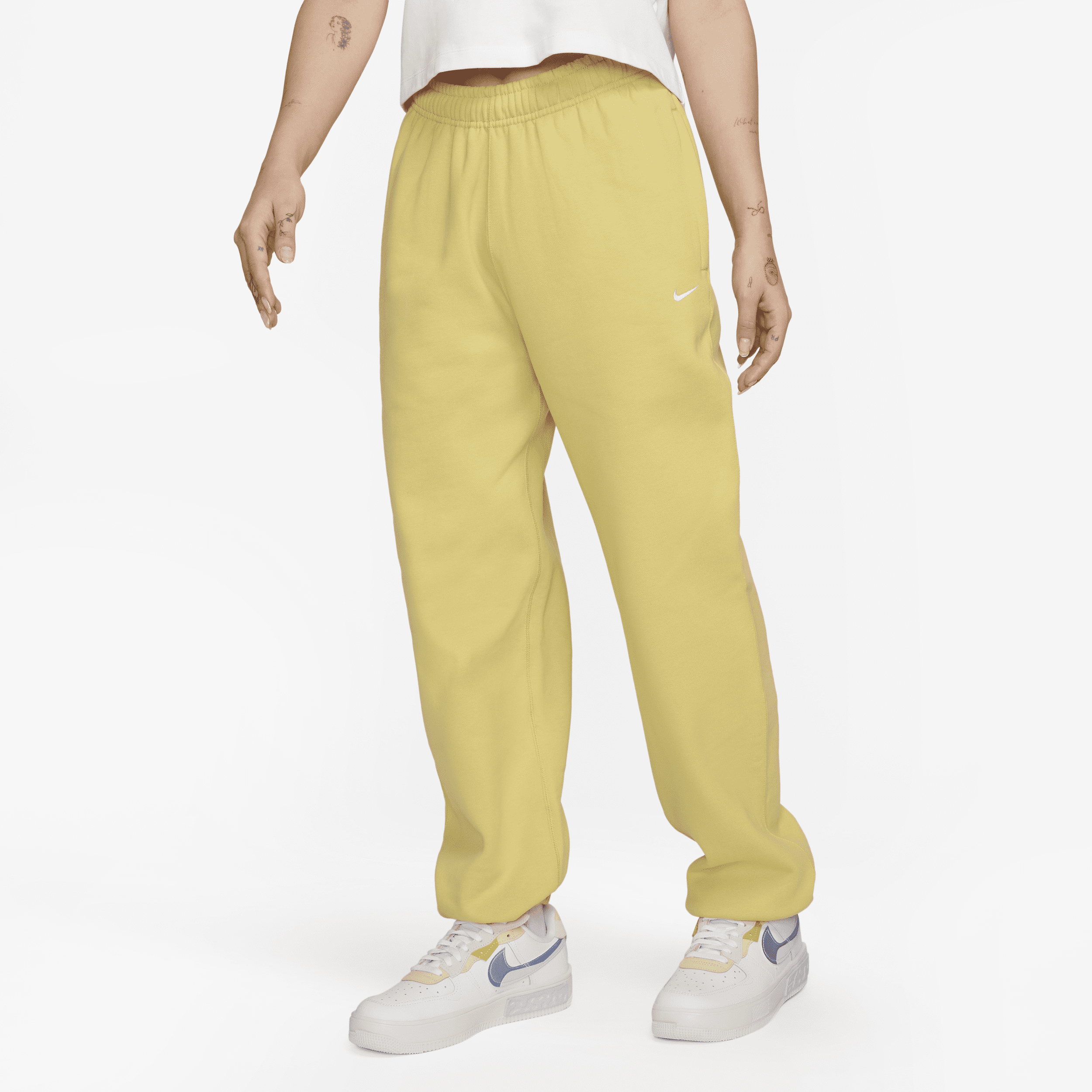 Nike Solo Swoosh-fleecebukser til kvinder - gul
