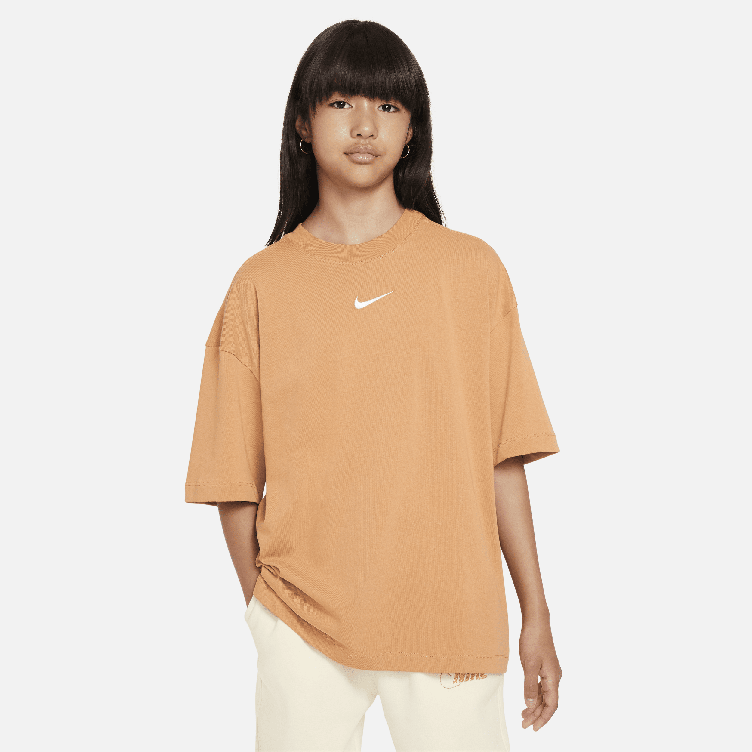 Overdimensioneret Nike Sportswear Premium Essentials-T-shirt til større børn (piger) - brun