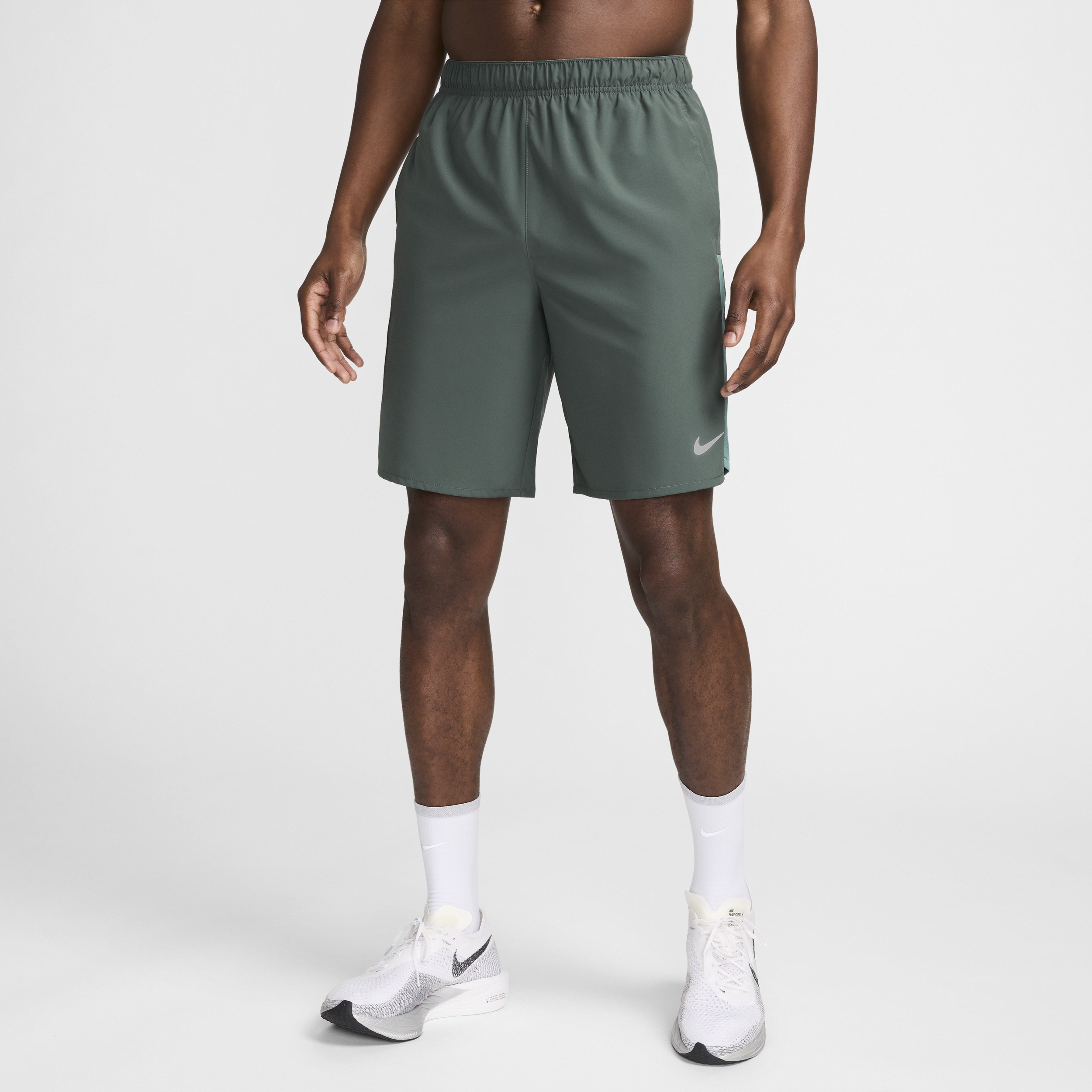 Alsidige Nike Challenger Dri-FIT-shorts (23 cm) uden for til mænd - grøn