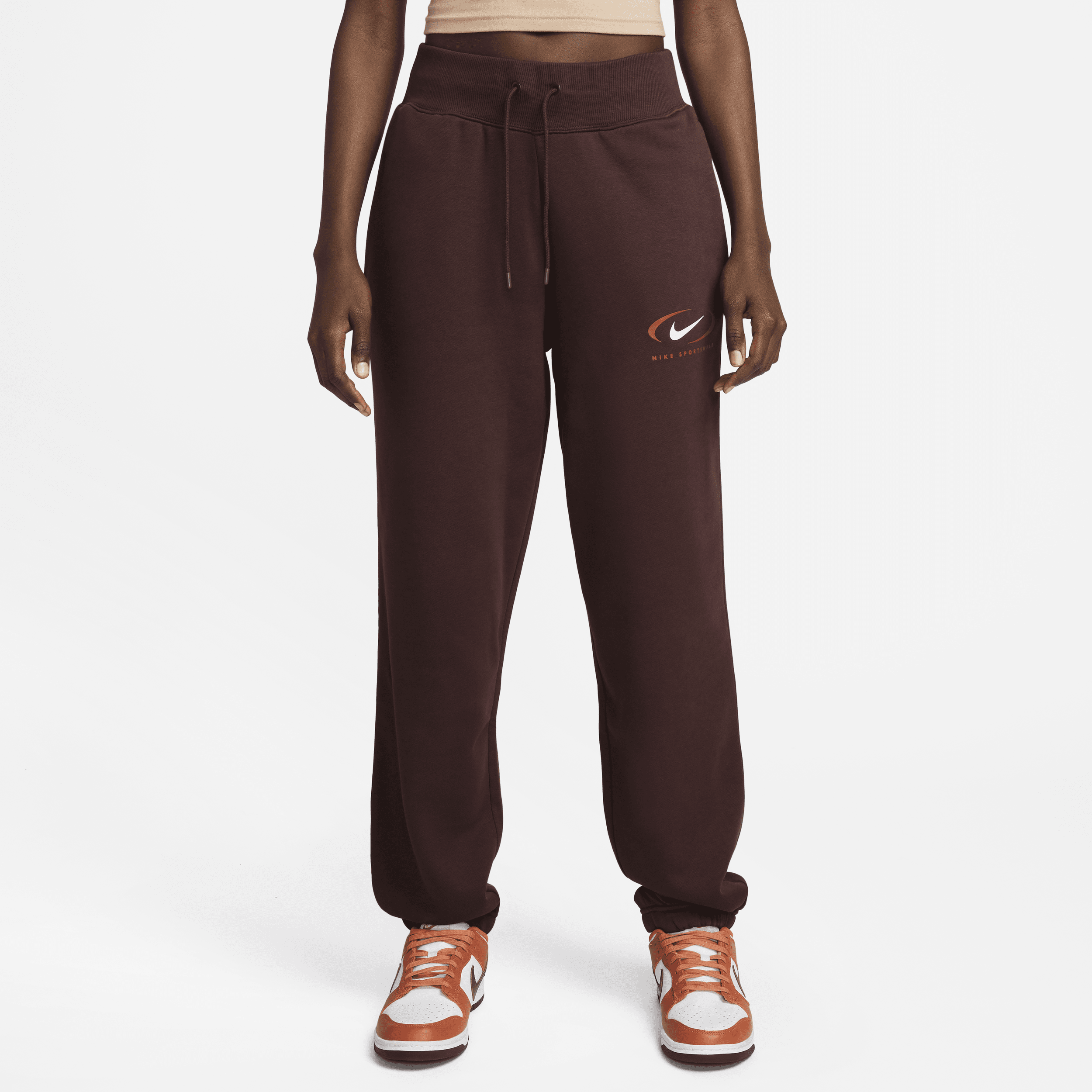 Overdimensionerede Nike Sportswear Phoenix Fleece-bukser med høj talje til kvinder - brun