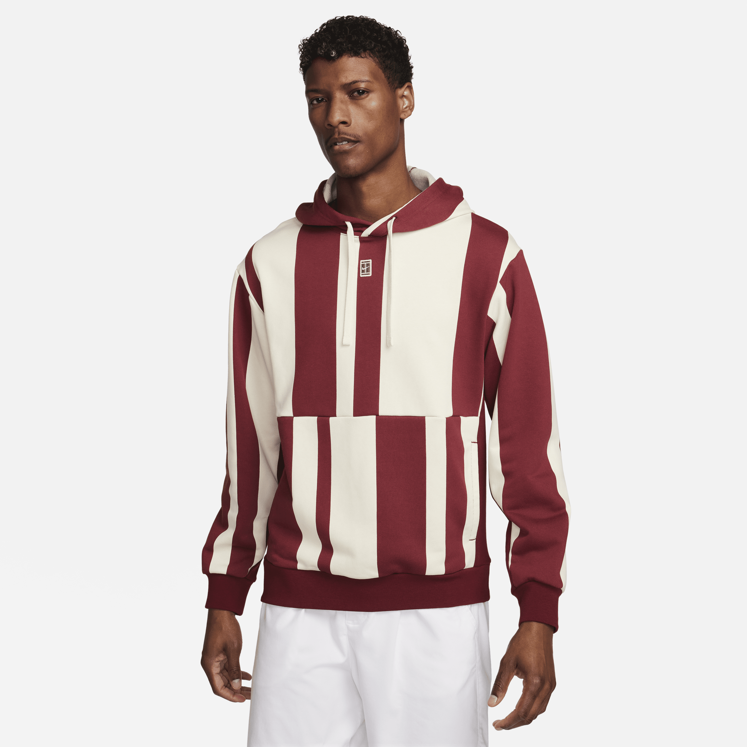 NikeCourt Heritage Dri-FIT-tennishættetrøje i fleece til mænd - rød
