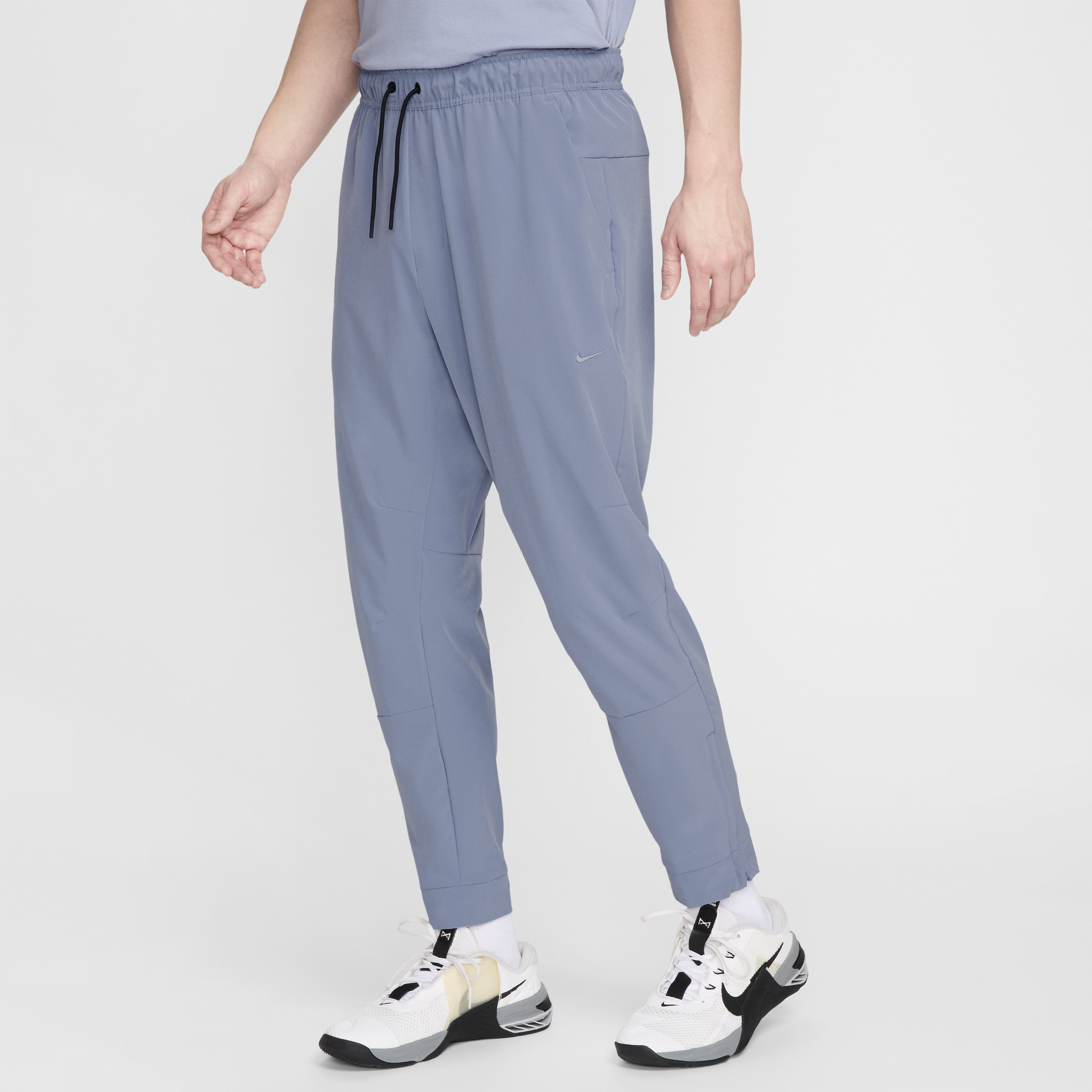 Alsidige Nike Unlimited-Dri-FIT-bukser med lynlåsmanchetter til mænd - blå