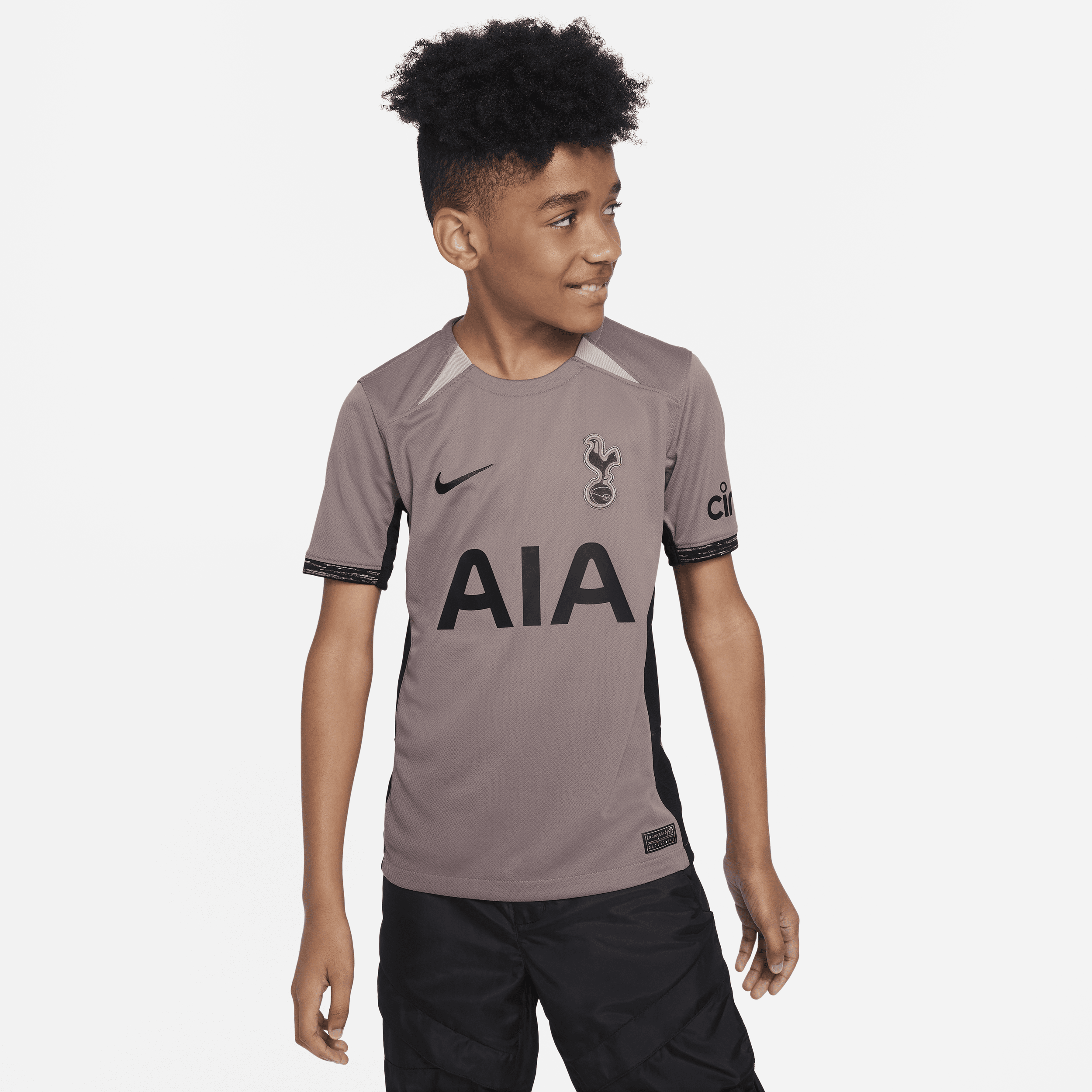 Tottenham Hotspur 2023/24 Stadium Third Nike Dri-FIT-fodboldtrøje til større børn - brun
