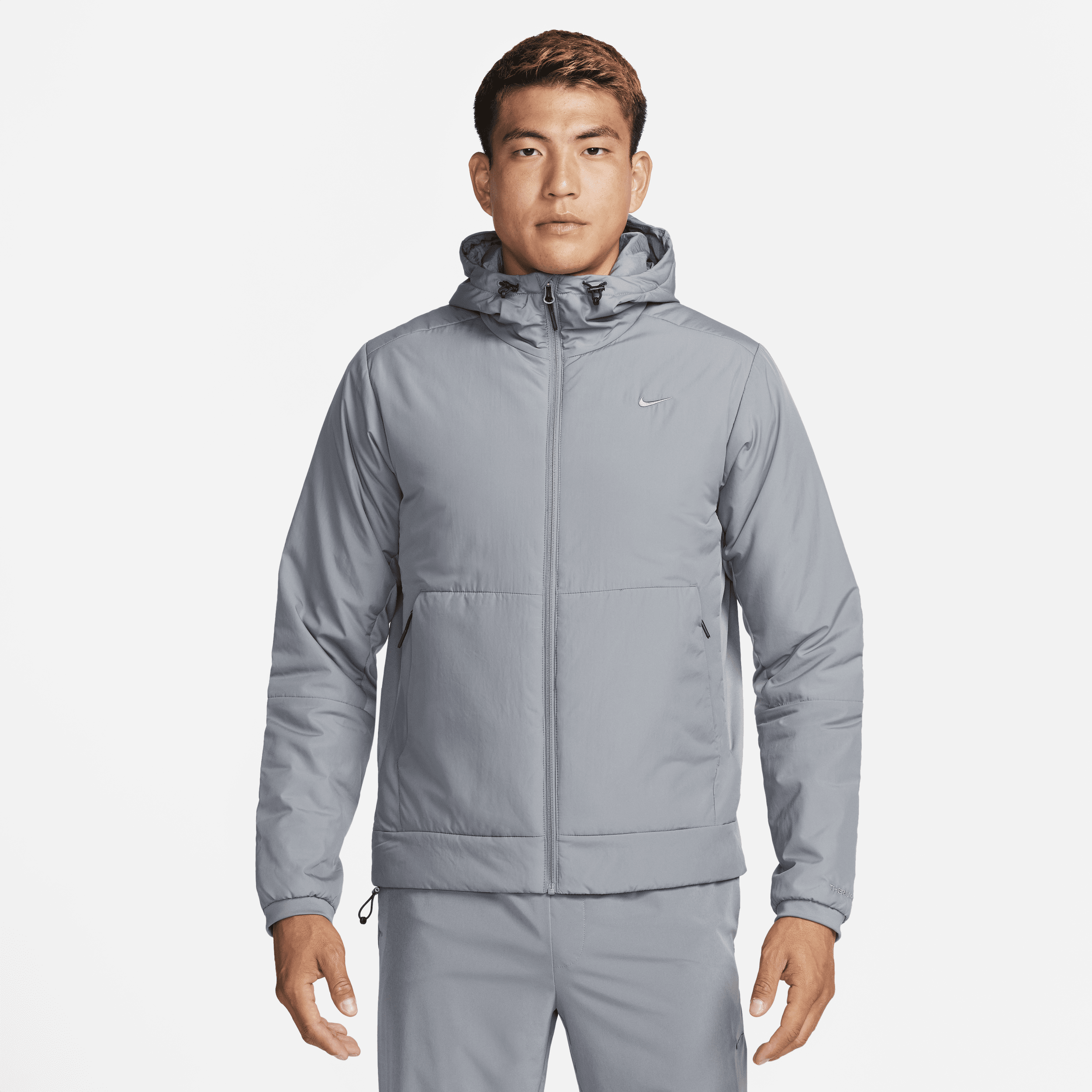 Alsidig Nike Unlimited Therma-FIT-jakke til mænd - grå