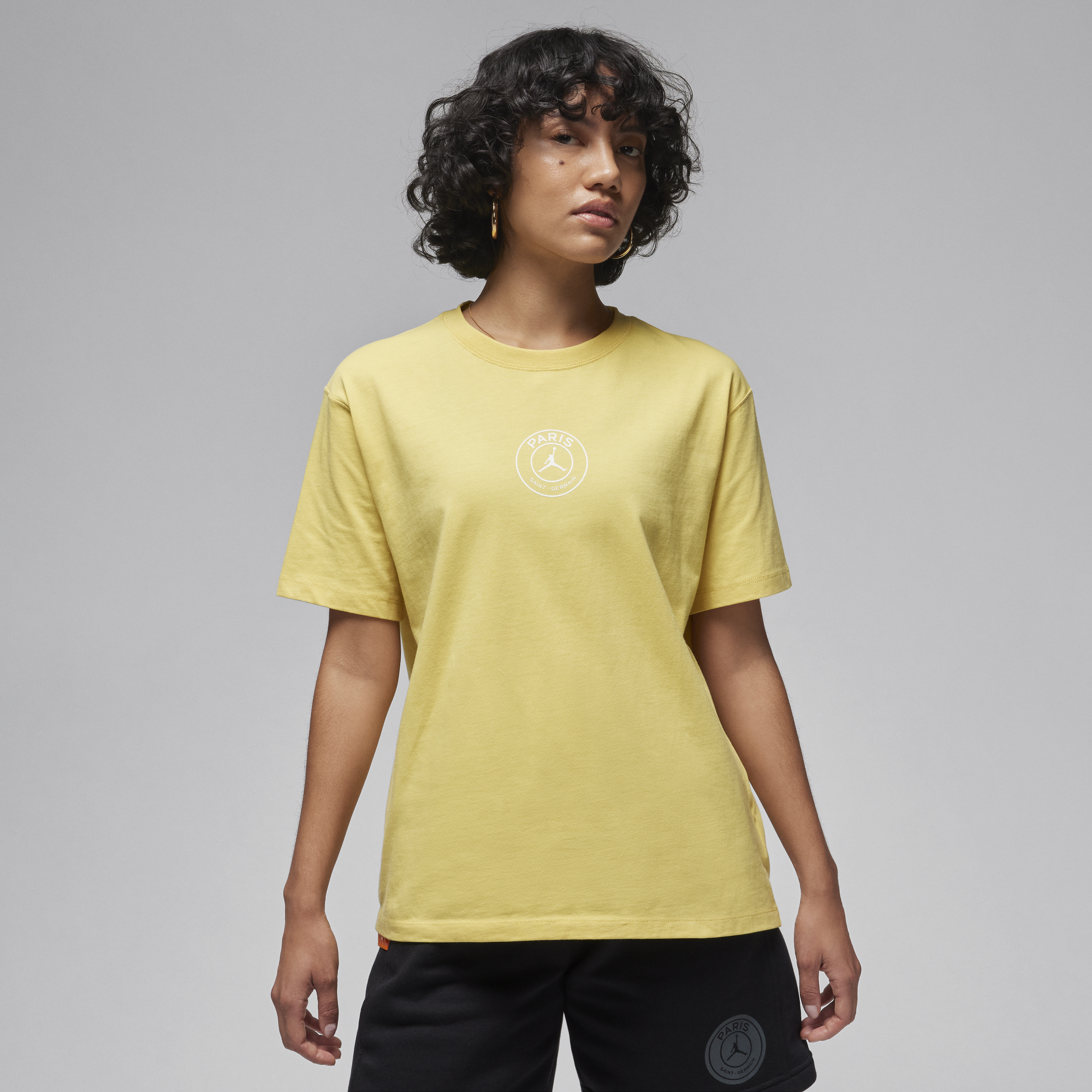 Nike Paris Saint-Germain Jordan-T-shirt til fodbold med grafik til kvinder - gul